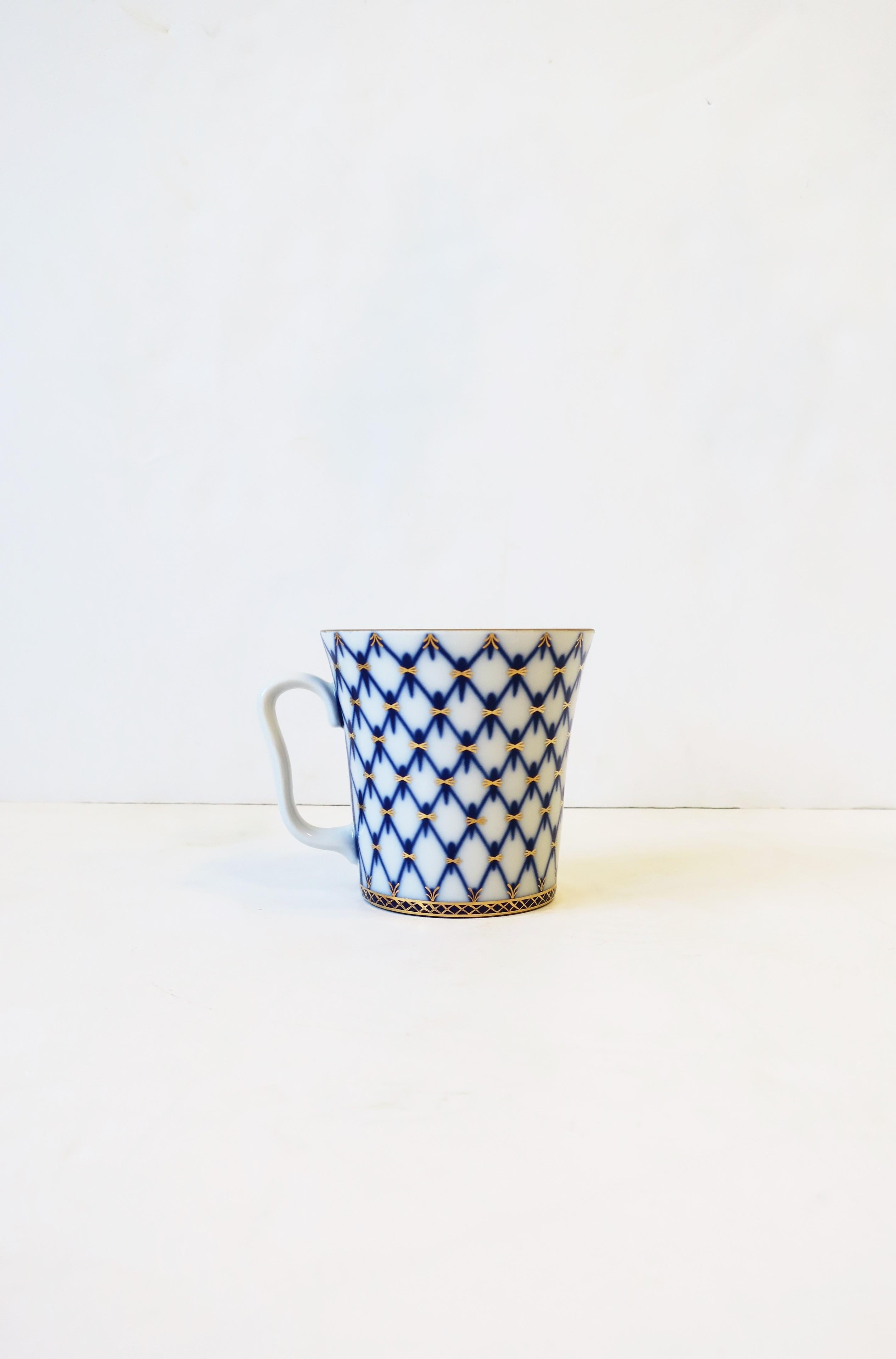 Glazed Russian Blue and Gold Coffee or Tea White Porcelain Cup