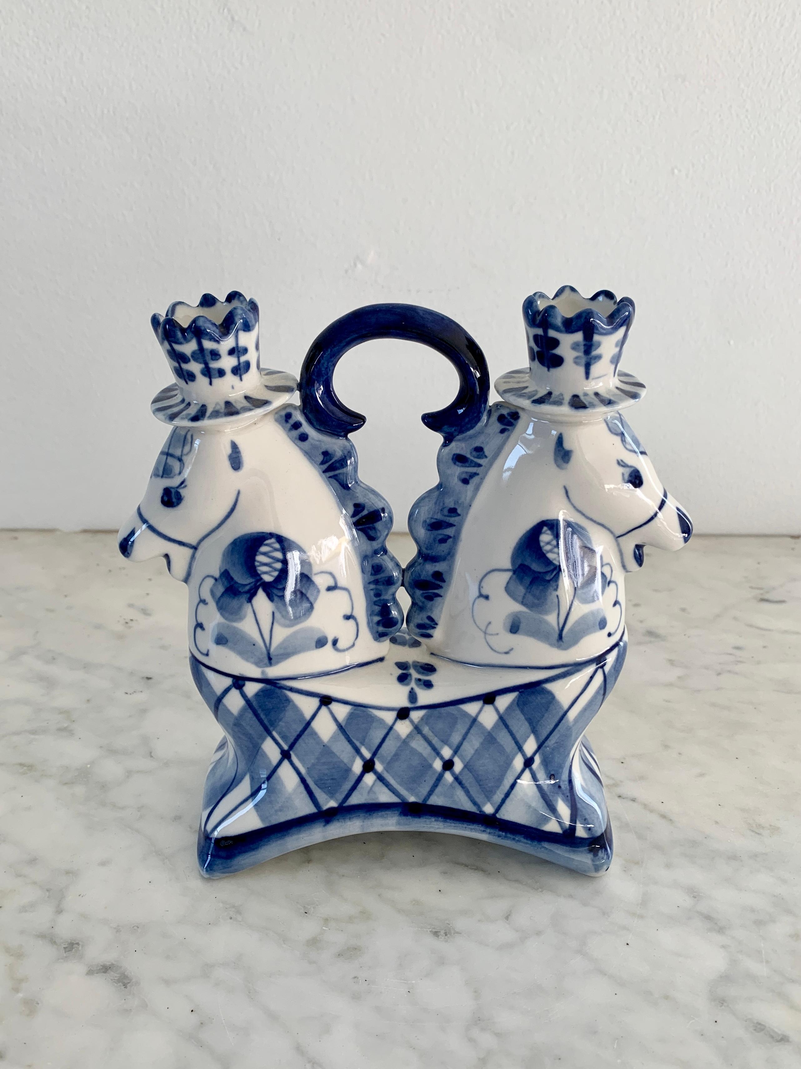 A wonderful blue and white porcelain double horse candle holder.

Russia, Late-20th Century

Measures: 6.5