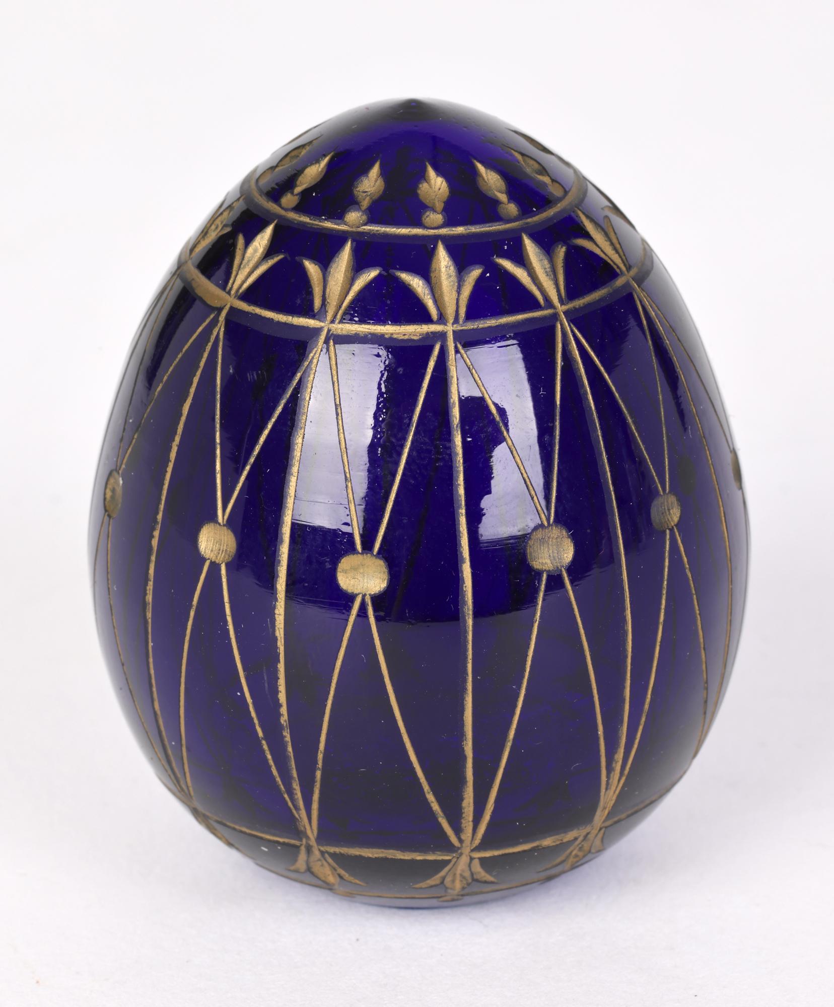 Russian Blue Glass Egg with Engraved Designs Faberge Label 2