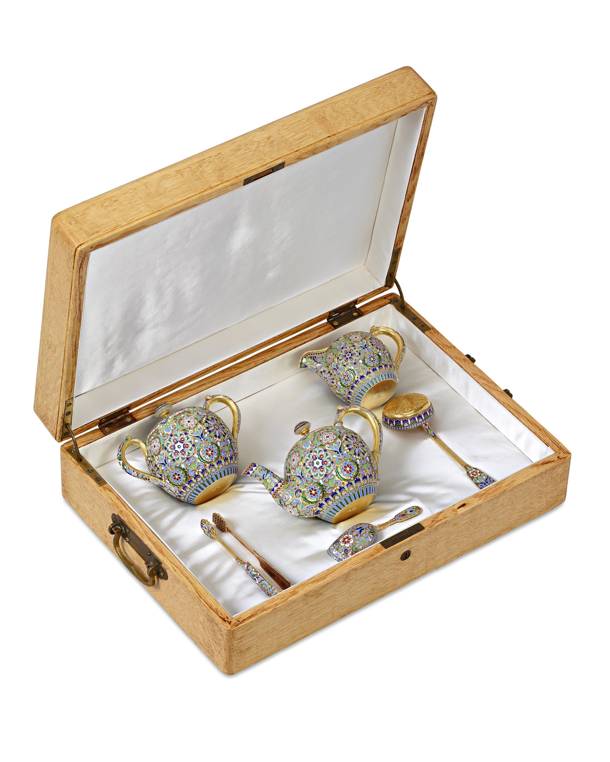 This exceptional Russian cloisonné and enamel tea set is the work of Pavel Akimovich Ovchinnikov. One of Russia’s most skilled enamel artisans, Ovchinnikov is credited with marrying the champlevé, cloisonné and plique-à-jour enameling techniques