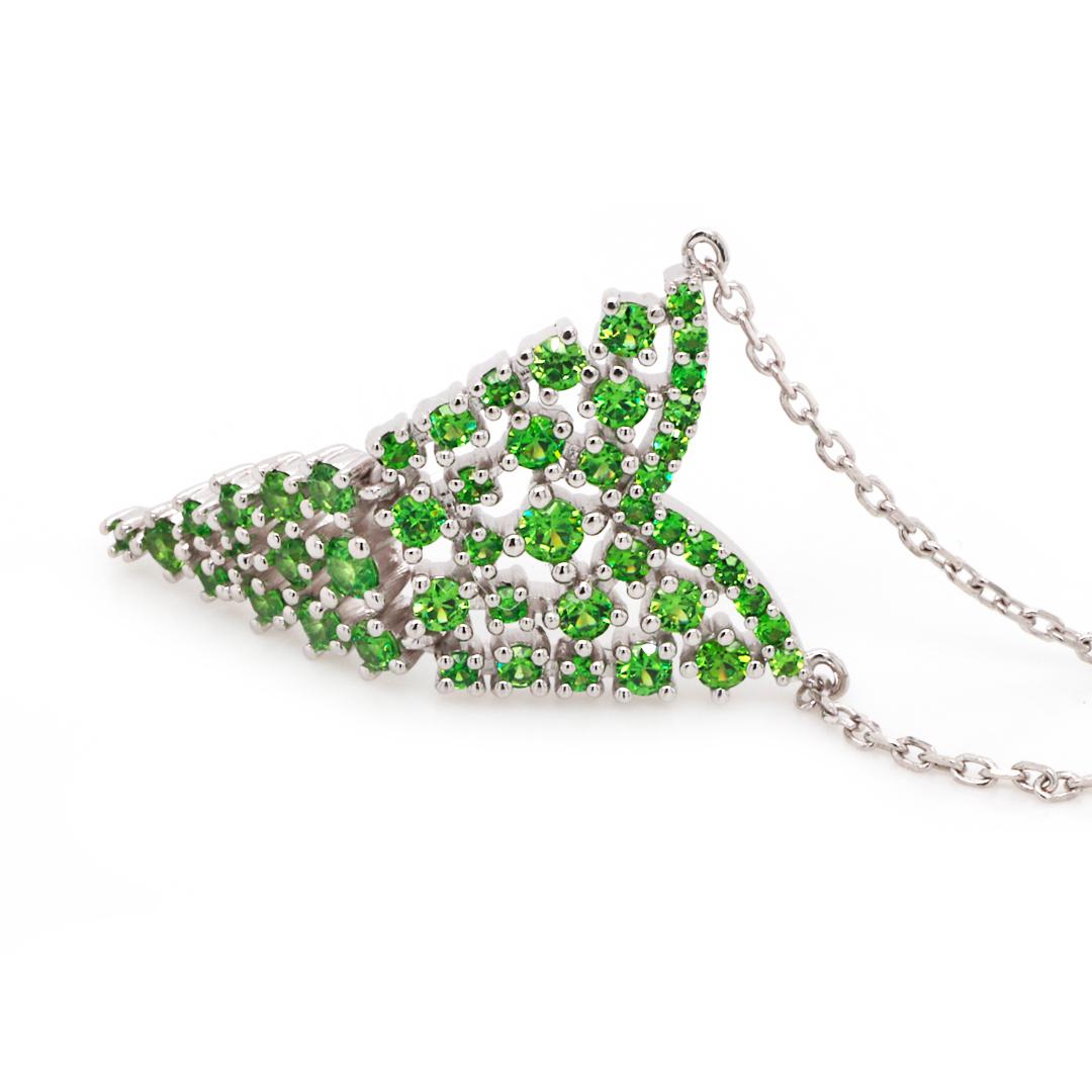 Simple but yet captivating Demantoid Pendant set in 18 Karat White Gold. 
Featuring top quality brilliant-cut Russian Demantoids 0.66-carat total weight. 

The elegant design makes it perfect for everyday wear, it will definitely emphasize your