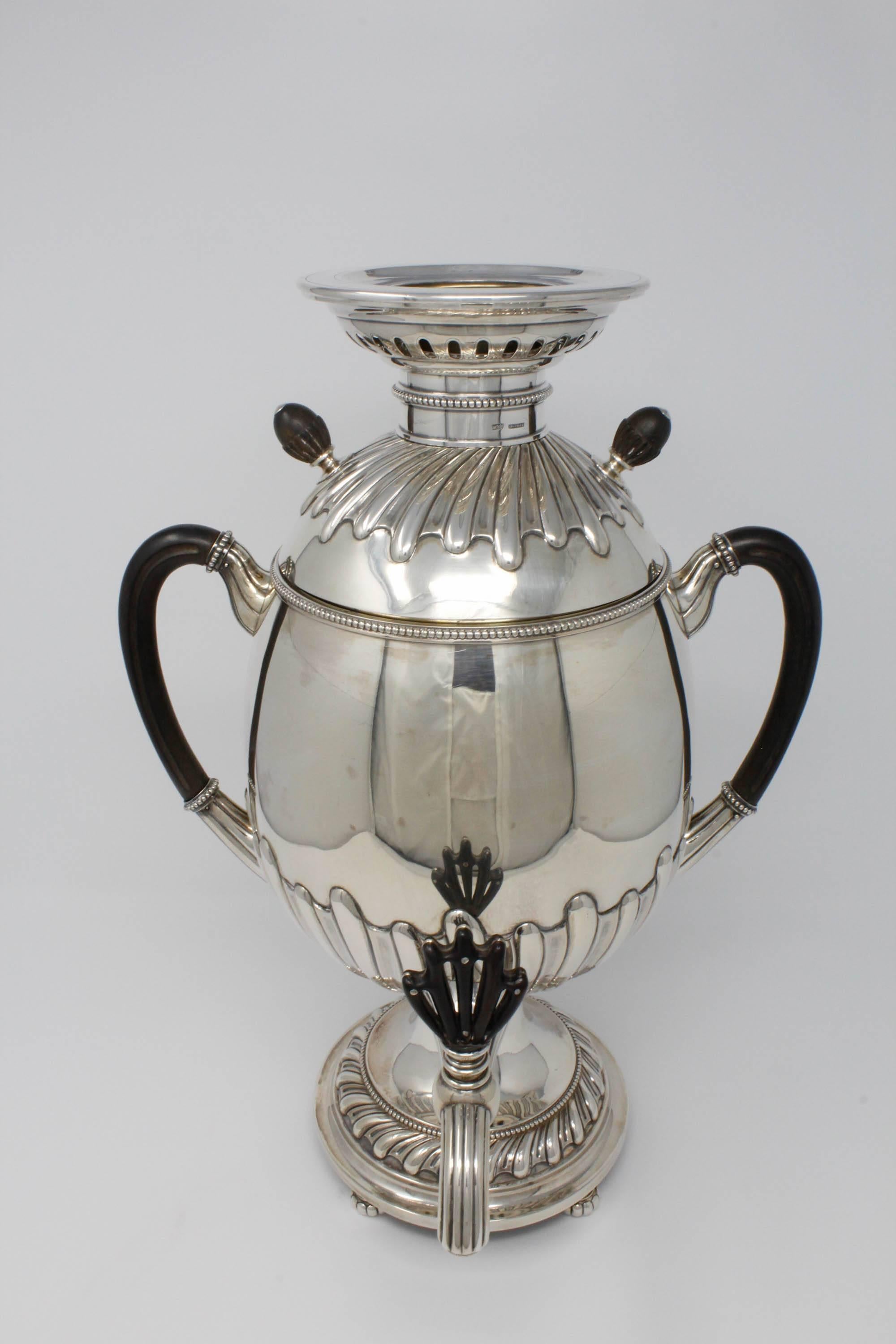 Russian Egg Shaped Samovar with Ebonized Wood Handles, Sterling Silver with Gilded Interior. Samovar has original wooden handles, knobs, finials, and spout. Has bun feet and Interior is gilded. 88 zolotziks= 916.6 Silver. Hallmark is clear, but date