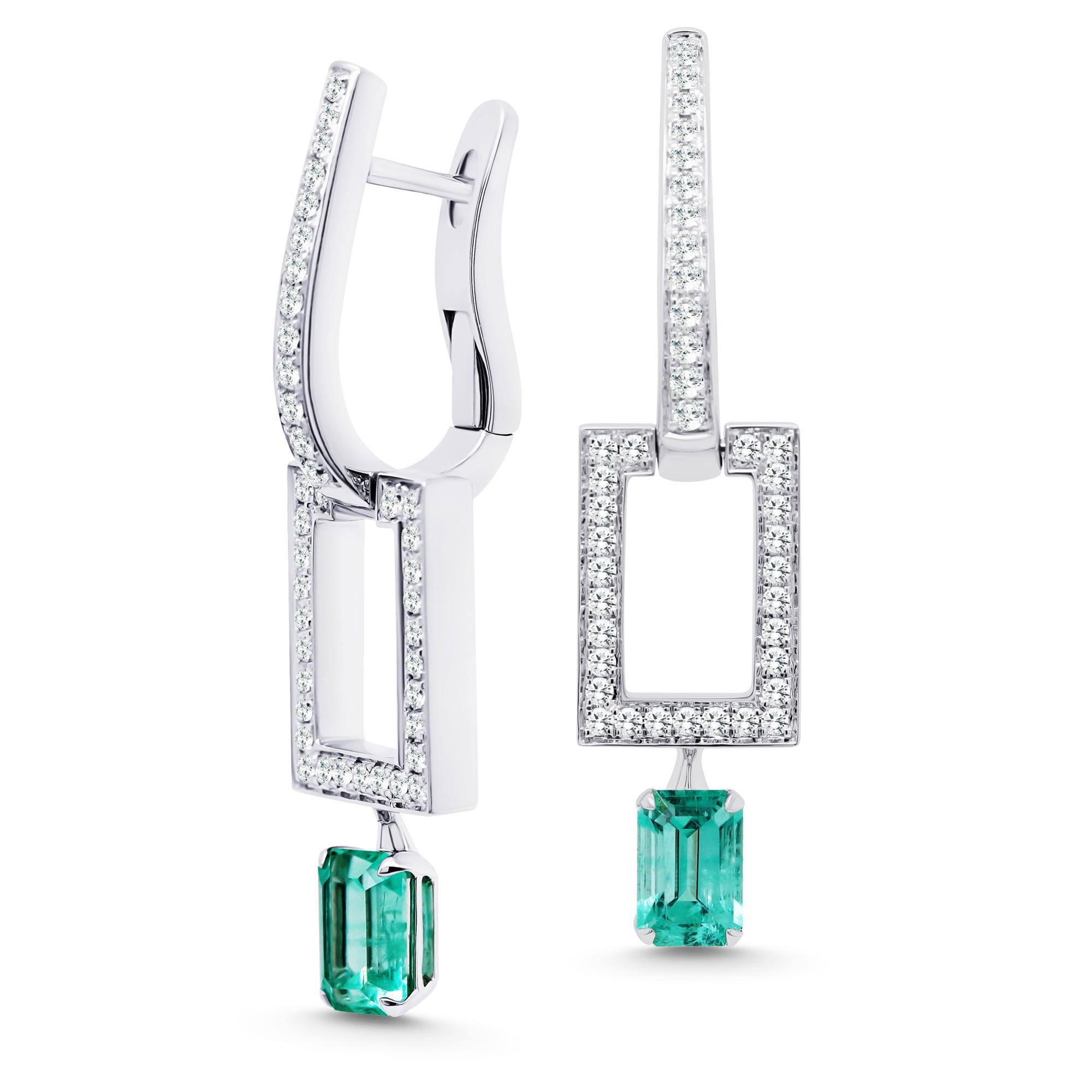 Real elegance is hidden in the details. Exquisite earrings with Emerald will help to emphasize it favorably and complete the look.
A beautifully matched pair of 0.6ct each Russian Emeralds surrounded delicately of Diamonds in a piece of timeless