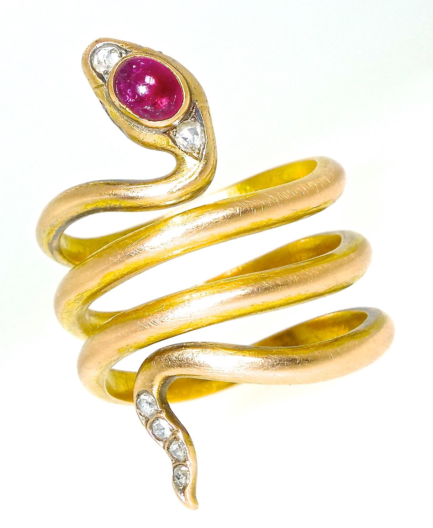 Faberge, workmates Erik Kollin, snake ring, gold, rose-cut diamonds in the head, eyes and tail, and with a cabochon ruby in his head.  Signed fully with St Petersburg marks, this snake ring, in fine condition, is physically large, from head to tail