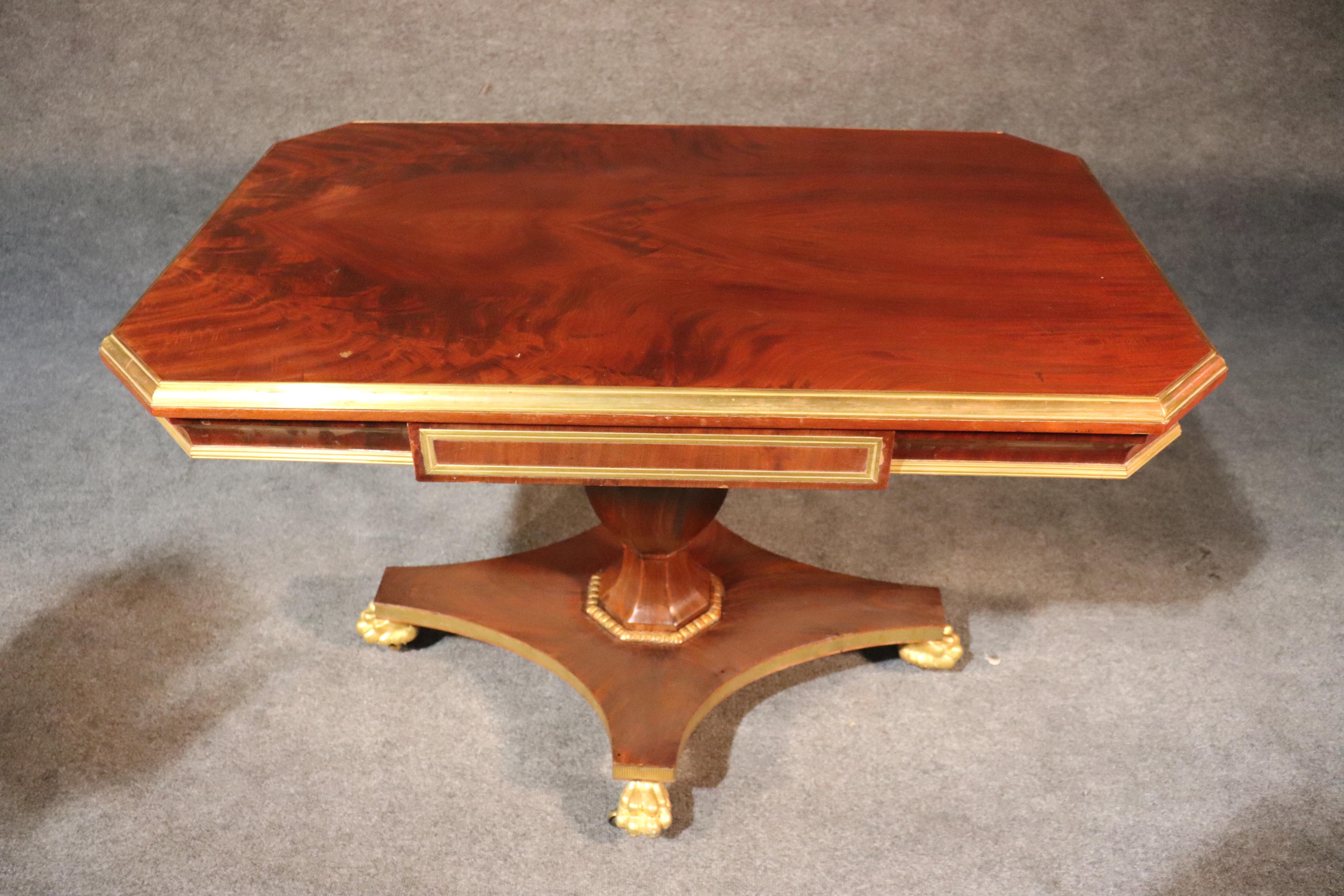 Mid-19th Century Russian Flame Mahogany Brass and Gilded Regency Style Paw Footed Writing Table