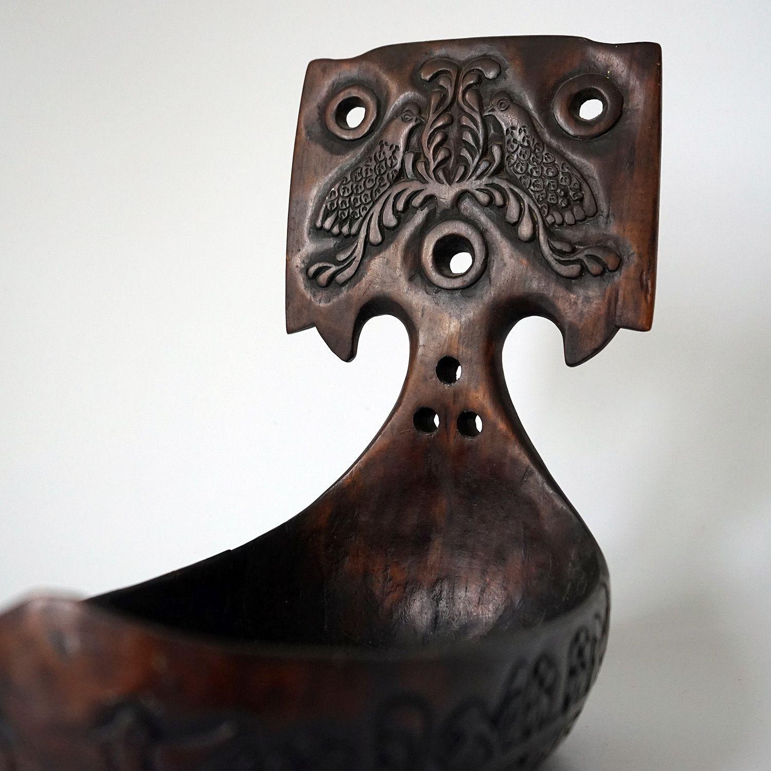 Antique Arts and Crafts carved wooden drinking vessel

A carved Russian Kovsh, a boat-shaped drinking vessel originally intended for mead.

Unsigned but we have identified an almost identical example which Sotheby’s identified as by the Abramtsevo