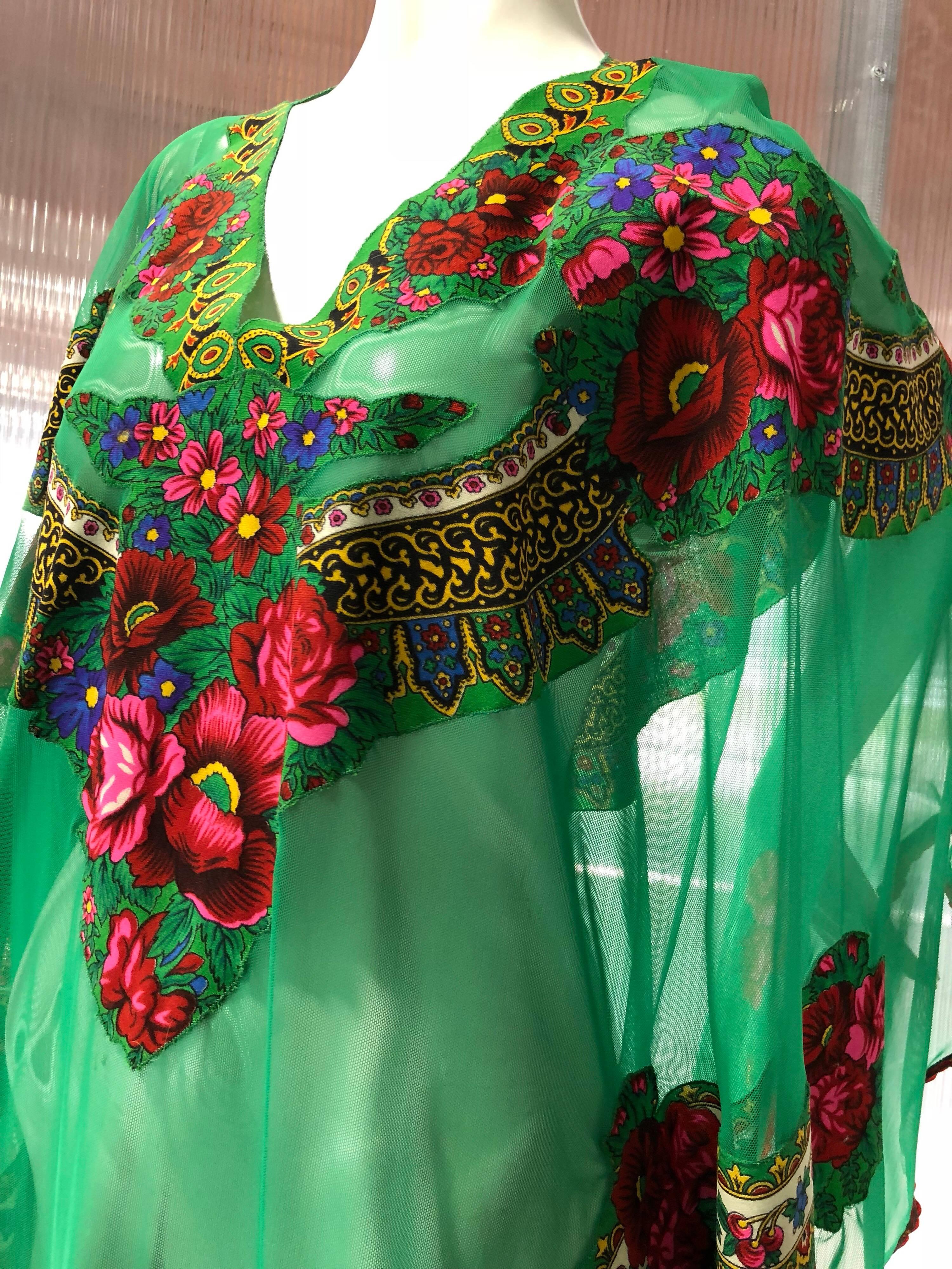 Russian-style Gypsy floral applique emerald green net caftan with floral ribbon trim has been fashioned from a vintage Ukranian wool challis textile. Voluminously cut--great for a swimsuit cover-up or a vacation get-away! Fits up to US size 10.