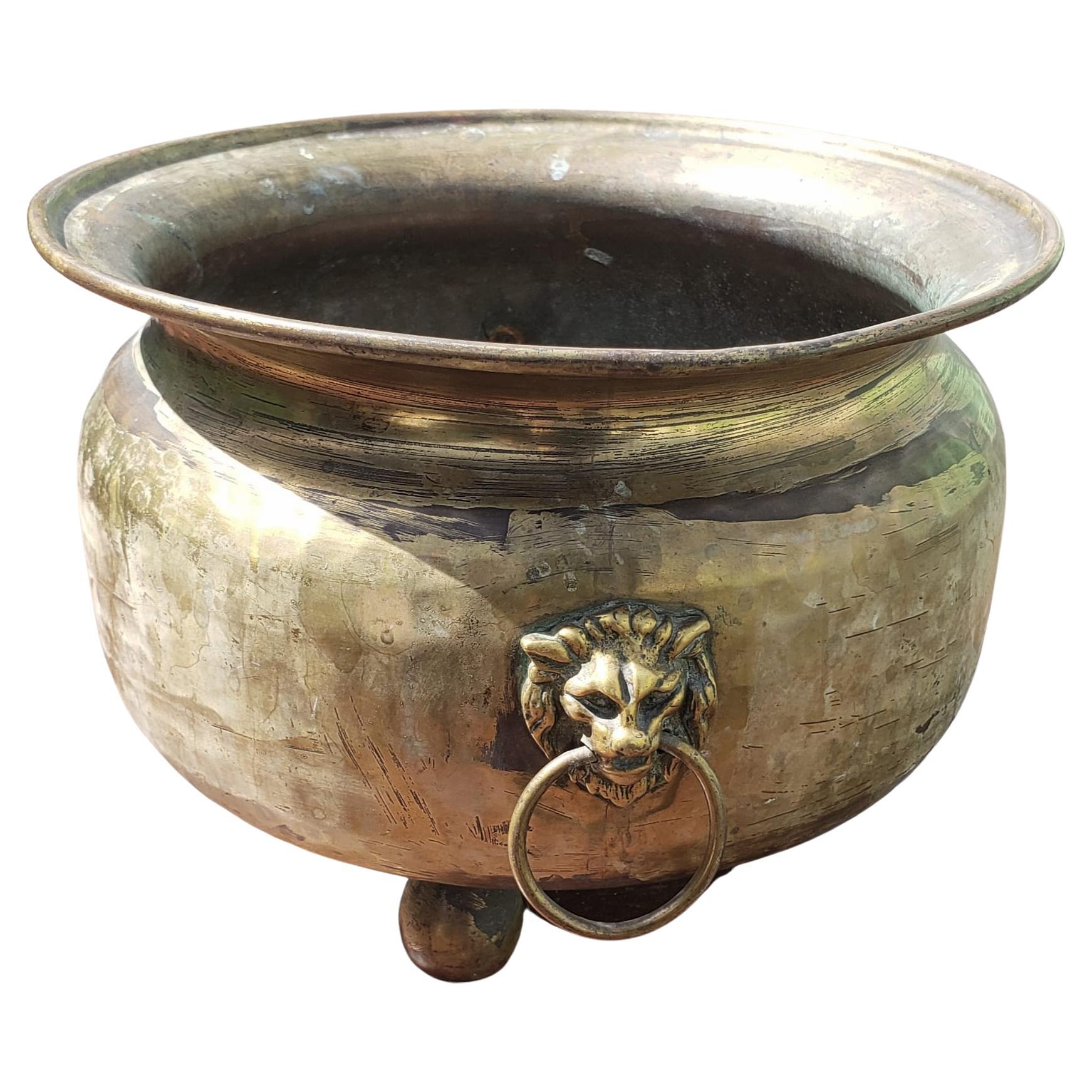 Edwardian Russian Hand Hammered Brass Two Handle Footed Jardiniere Planter with Lion Heads For Sale