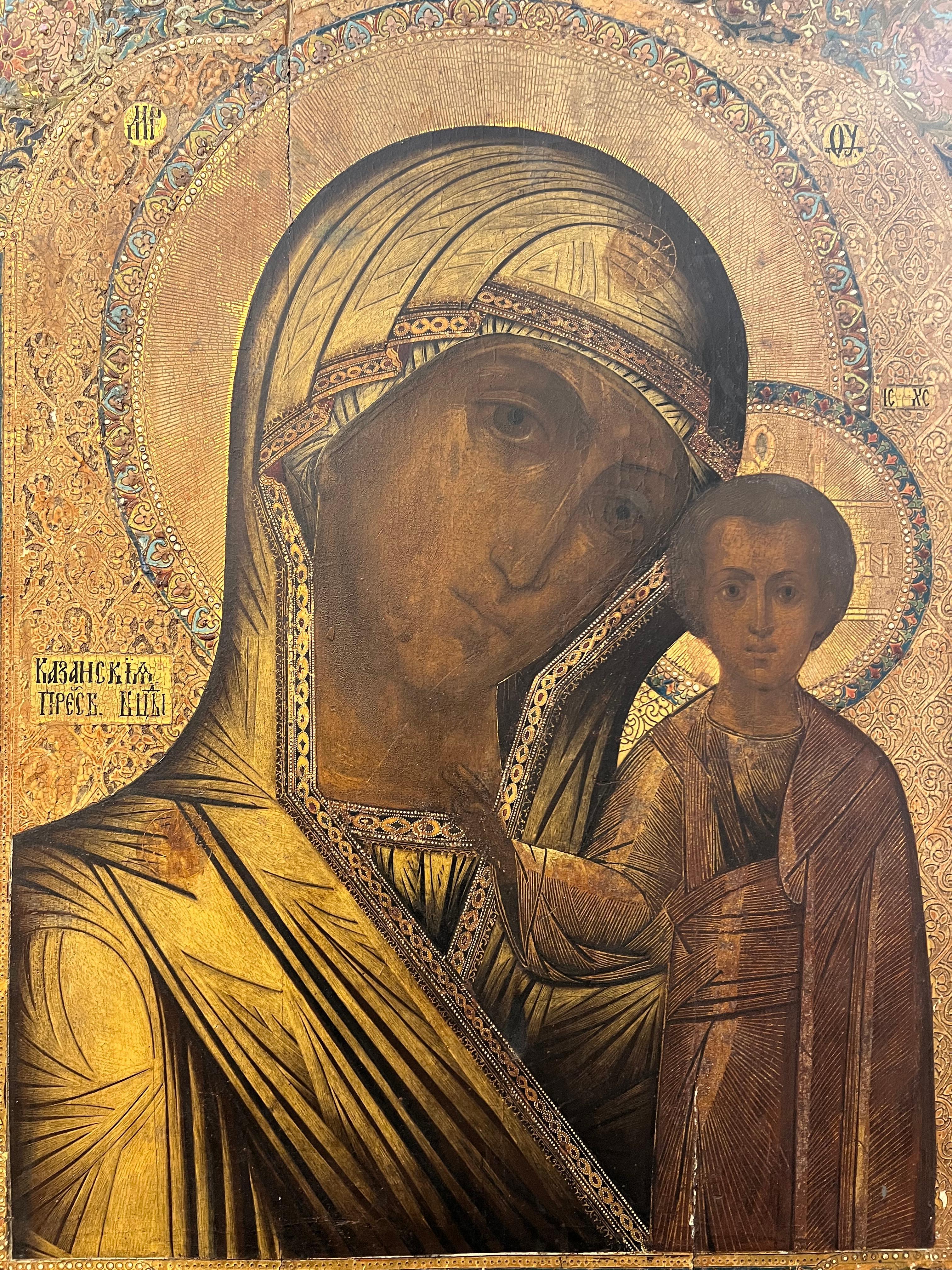 Russian Icon of the Kazan Mother Of God. 
Beautifully decorated with cloisonne enamel at the edges. 
The condition is good. Few damages are visible on the surface. 

Russia, c. 1870s
28