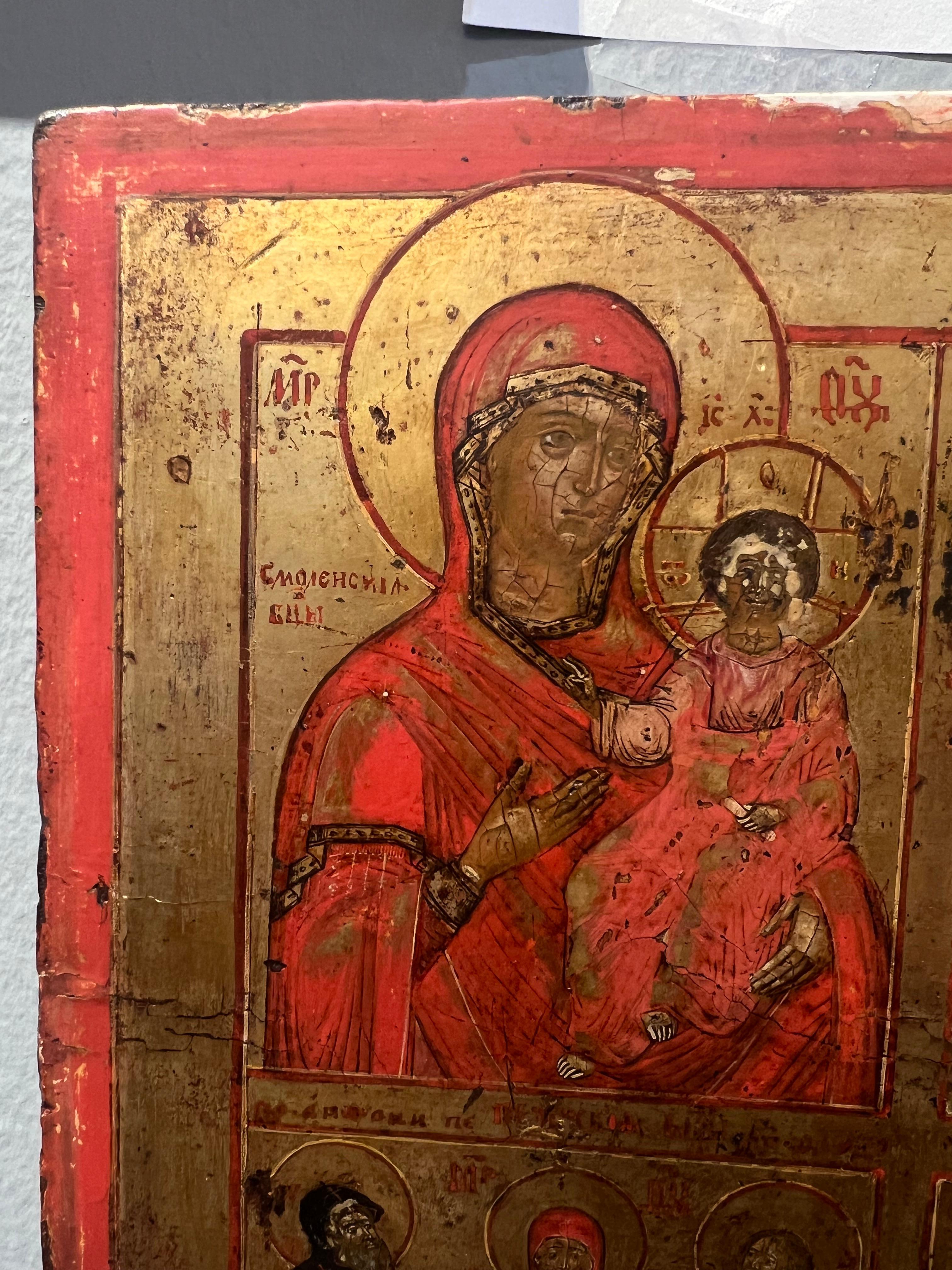 Icono ruso que representa imágenes de la Madre de Dios de las ciudades de Smolensk y Vladimir, junto con cuatro santos. 
Pintado sobre un panel de madera. El estado es bueno.
13 