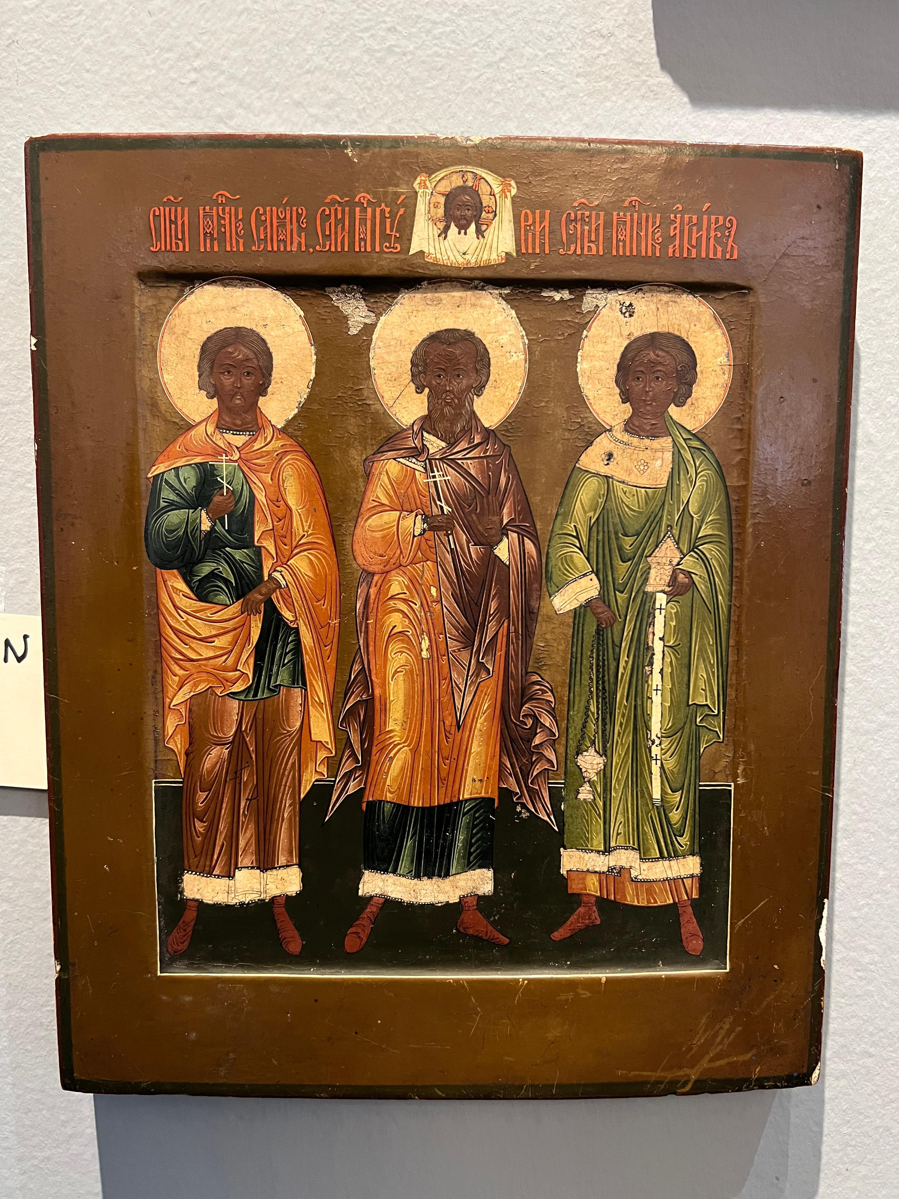 Russian Icon of Three Saints. 
The condition is good. Some damage is visible on the surface, loss of paint. 

Russia, c. 1840s
12