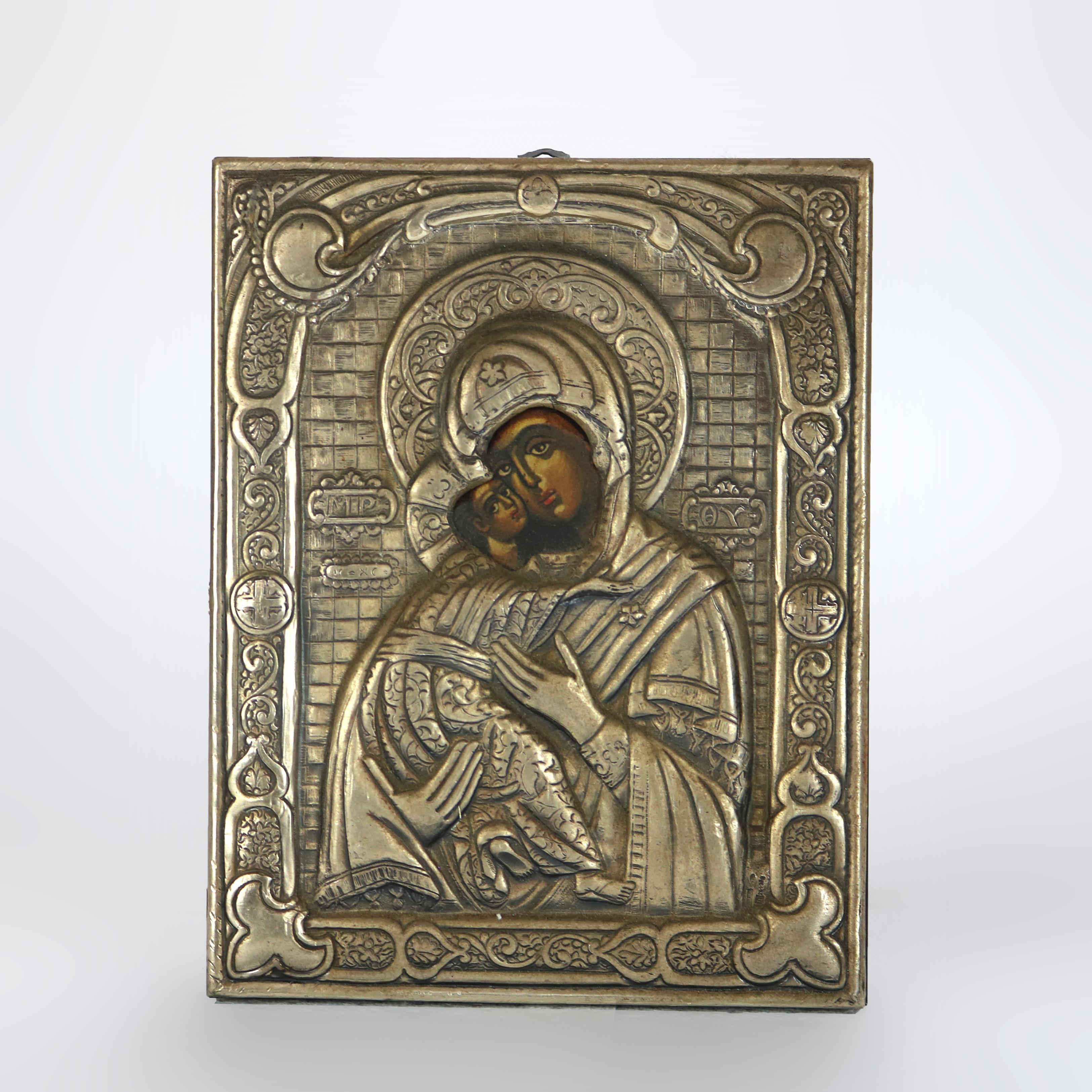 Russian Icon Portrait Of Mary And Baby Jesus Encased In Sterling Silver 20thC.
9 3/8