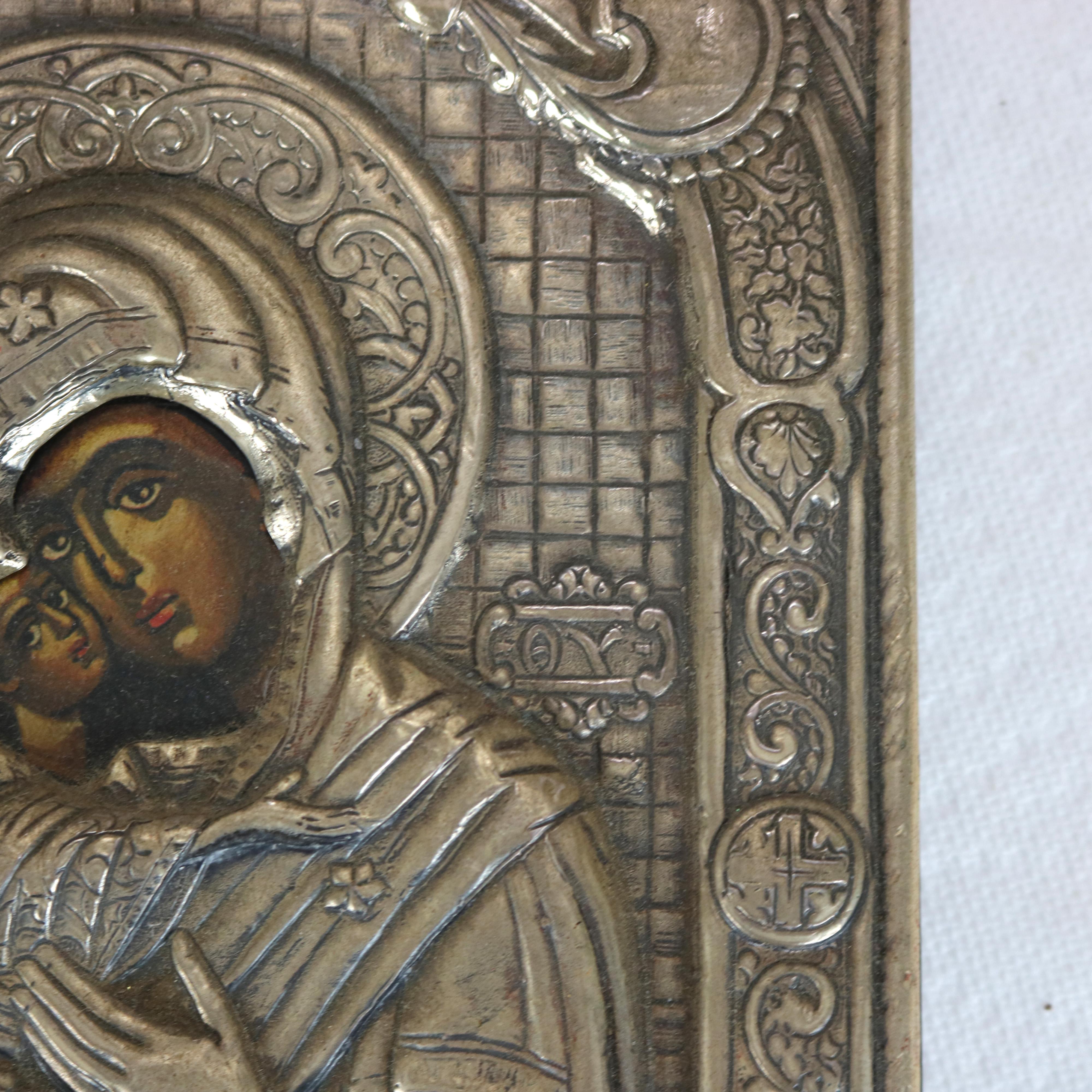 Wood Russian Icon Portrait Of Mary And Baby Jesus Encased In Sterling Silver 20thC