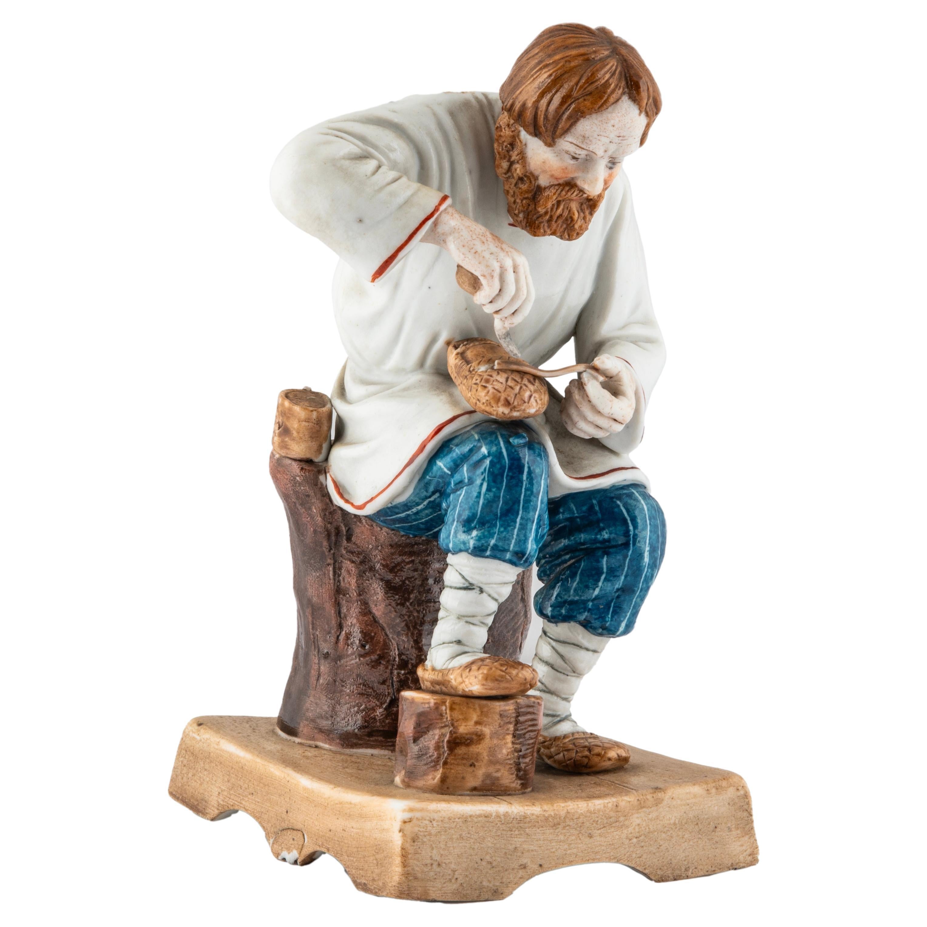 Russian Imperial-era Porcelain Figurine of Cobbler, Miklashevski, circa 1840 For Sale