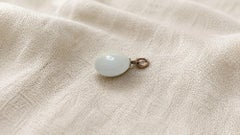 Russian Imperial Gold-Mounted White Jade Egg Pendant by Michael Perkhin