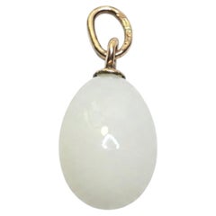 Russian Imperial Gold-Mounted White Jade Egg Pendant by Michael Perkhin
