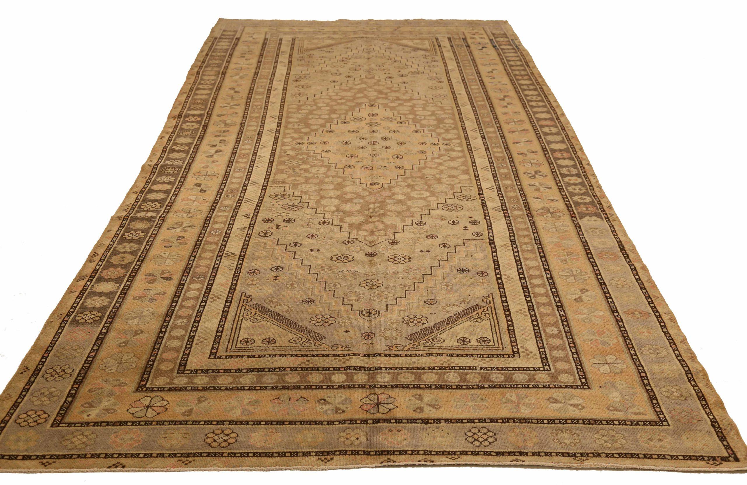 Discover the elegance of Russian Khotan featuring Area Rugs in Circa 1880. Designed with Wool and BrownIvory, this exclusive design is perfect for enhancing your space.