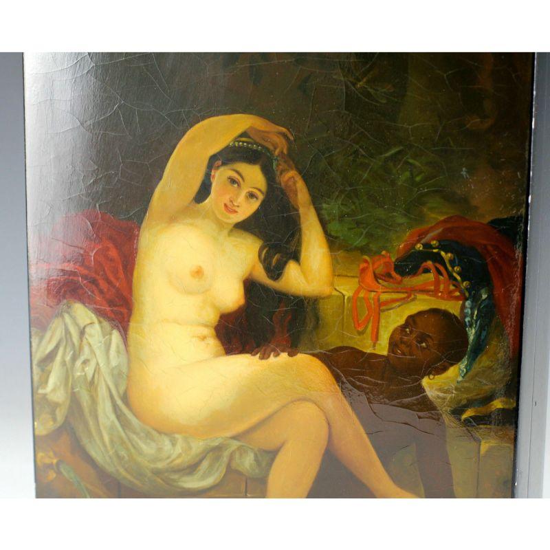 Russian Lacquerware Palekh Box, Nude Servant Beauty, Signed, Dated 1917

Russian lacquer ware palekh paws box - signed, dated 1917 - signature Indiscernible. Image of nude female figure sitting in her bathroom with African woman sitting next to