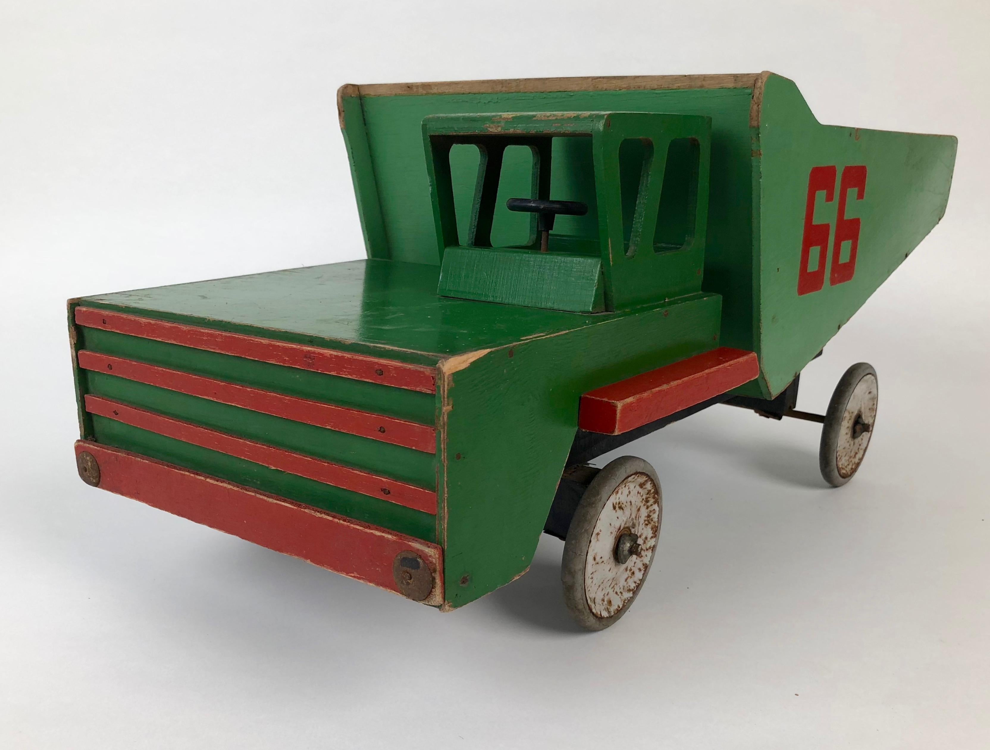 This wonderful wooden dump truck was made in USSR in the 1950s.
Lovely proportions, it´s not only a vintage toy, it´s work of art.
Condition in distress beauty.