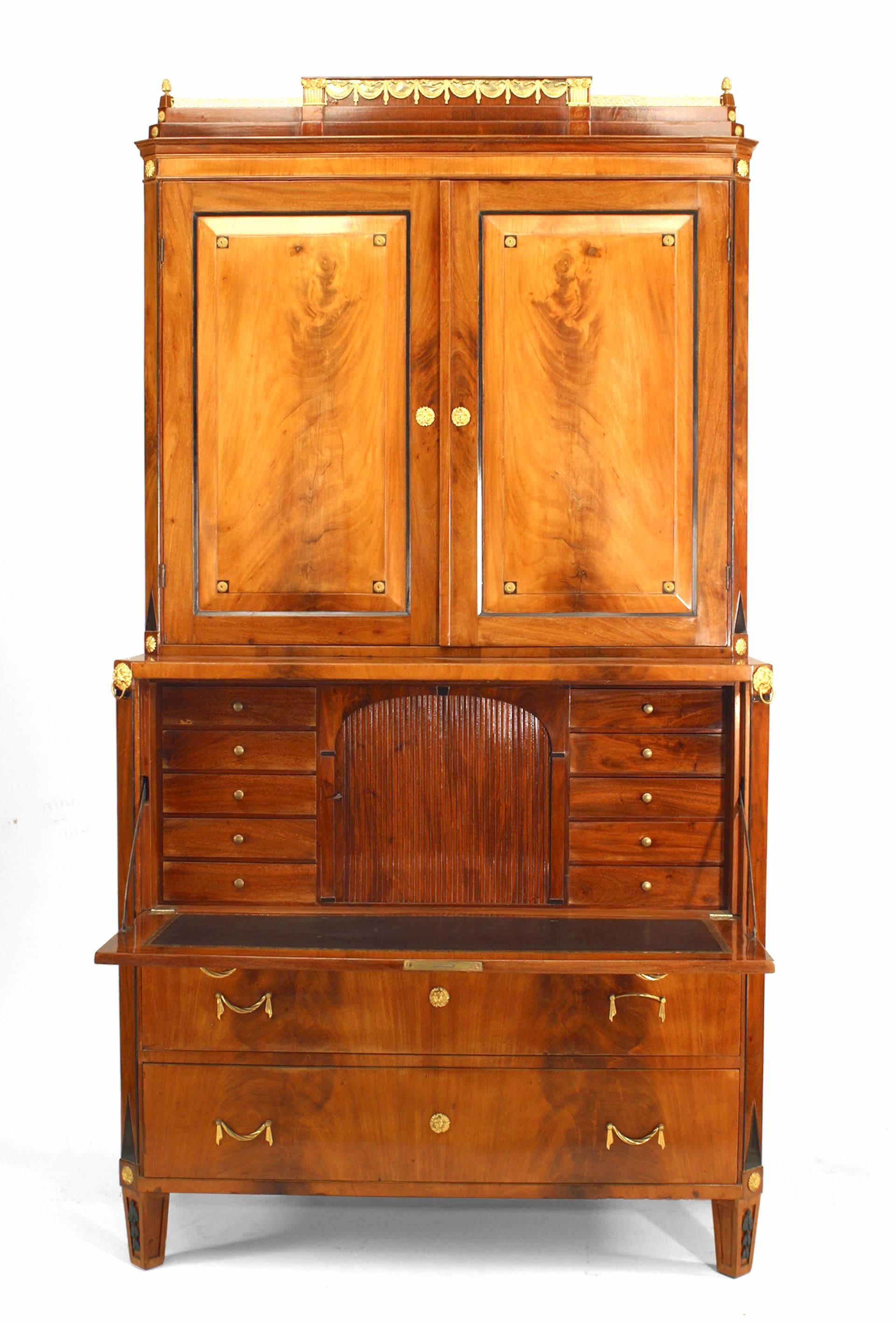 Russian Neoclassic (Late 18th/ Early 19th Century) ormolu mounted ebonized and mahogany secretaire cabinet with a Pair of doors above a fitted fall-front and 2 long drawers
