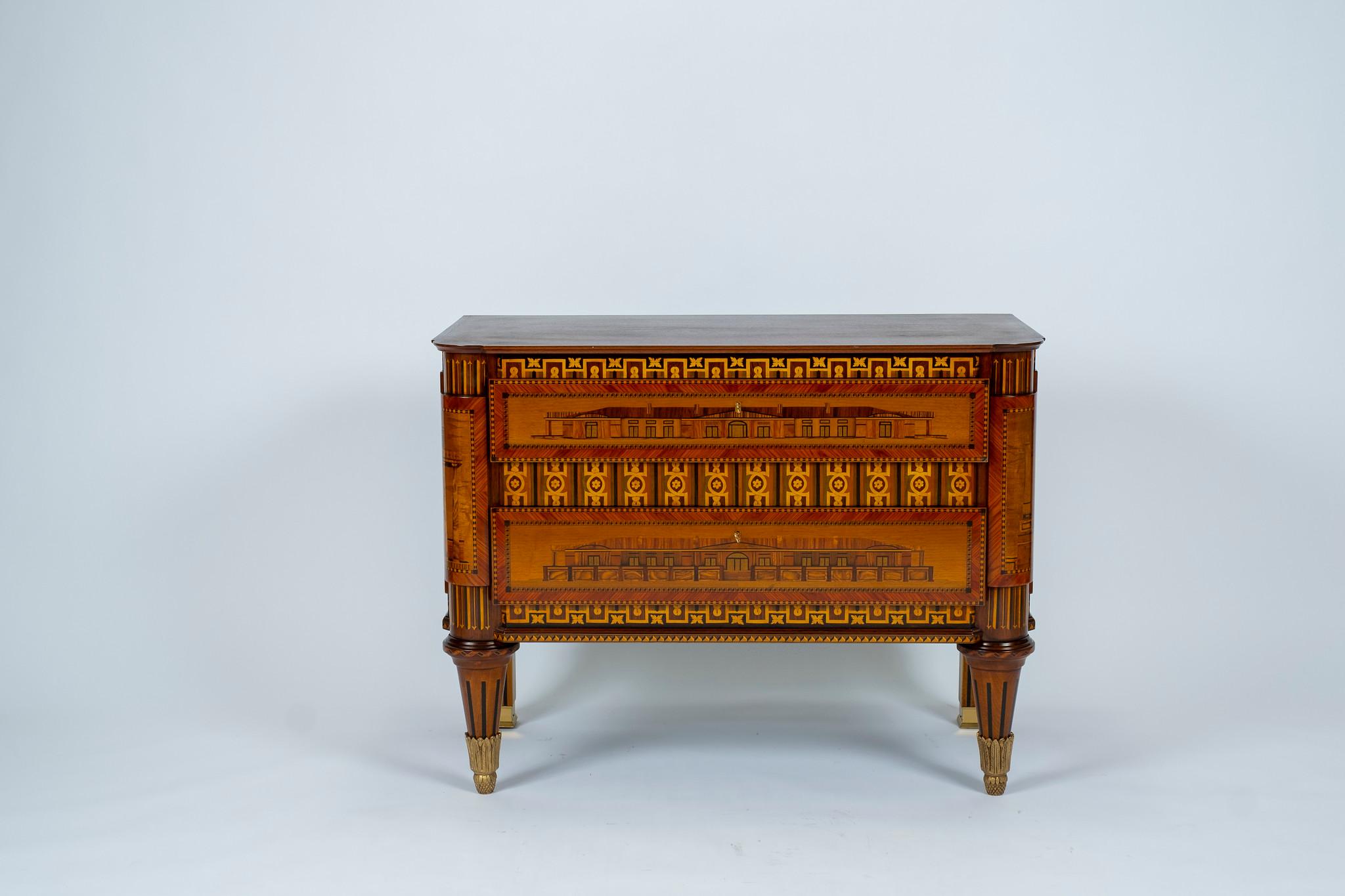 Available are two Russian neoclassical style commodes, sold individually. These cabinets are an outstanding example of a select group of pieces decorated with architectural views, many of which are attributed to Nikifor Vasilyev, a St. Petersburg