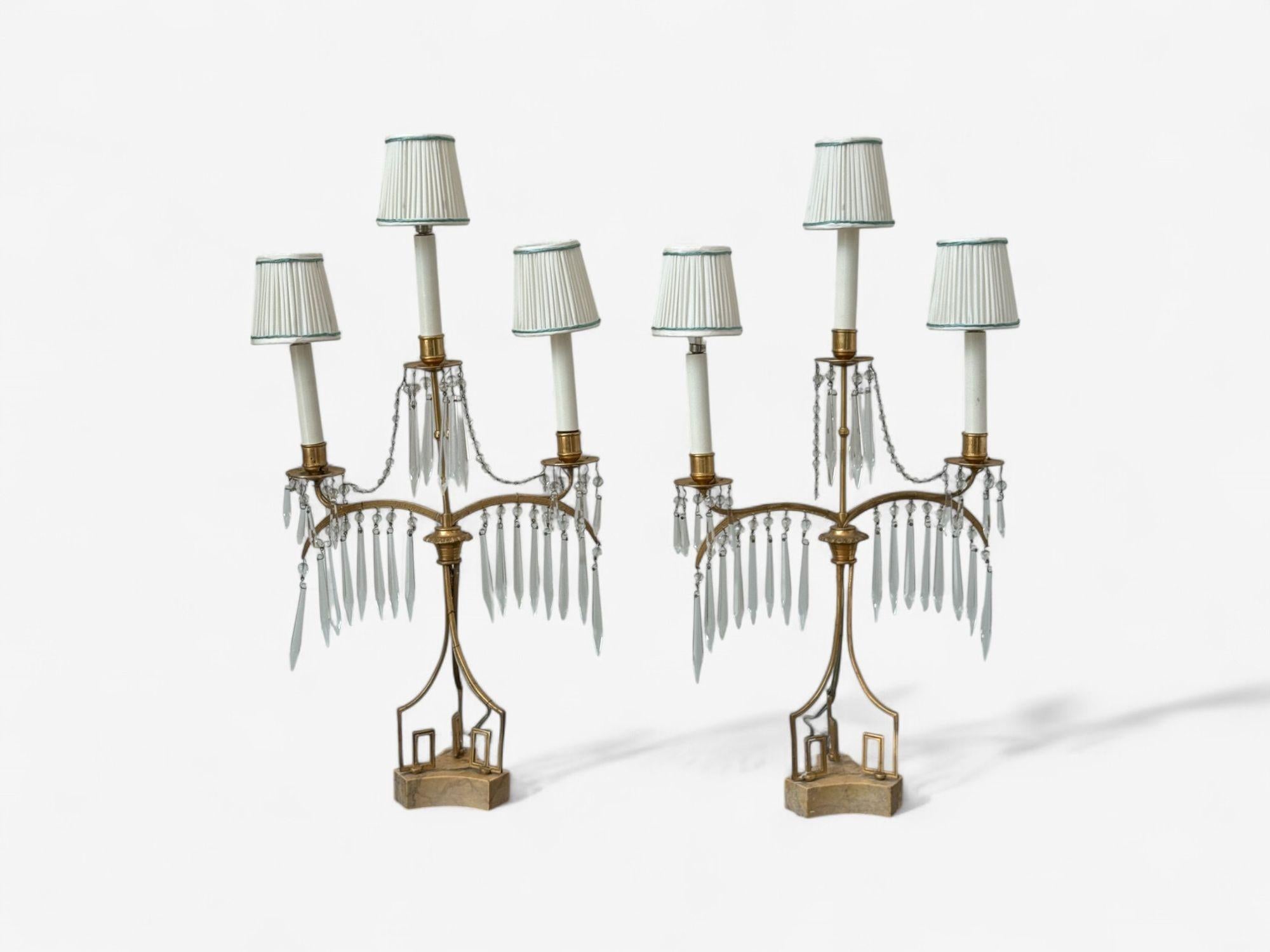 Russian Neoclassical, Dore Bronze, Crystal, Marble, Table Lamps, Russia, 19th c.

A refined pair of 19th-century Russian Neoclassical gilt bronze candelabra table lamps. Each example features three lights with cut crystal pendants suspended from