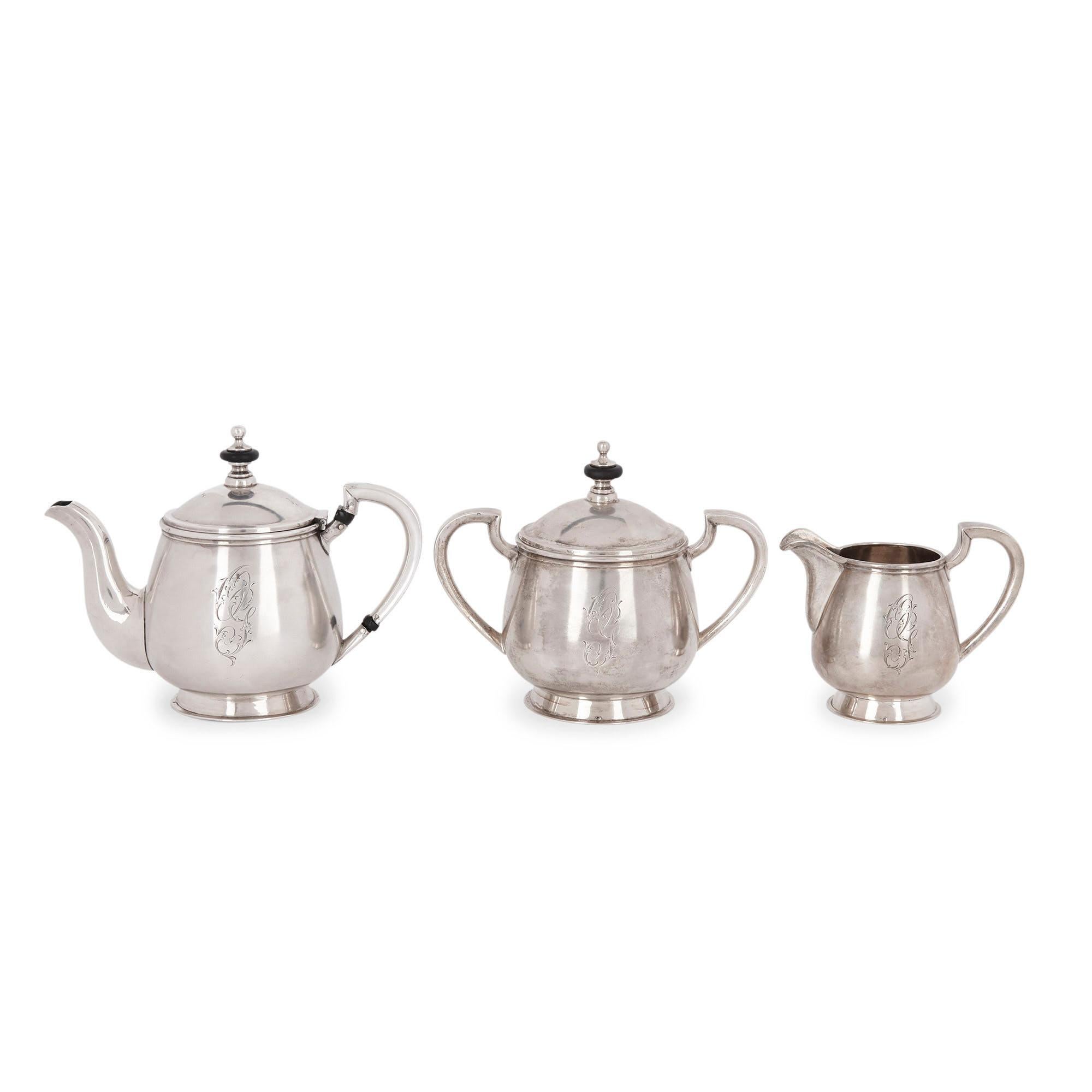Russian neoclassical style silver tea service
Russian, circa 1900
Teapot: Height 14cm, width 17cm, depth 9cm
Creamer: Height 9cm, width 11cm, depth 7cm

This superb set is crafted from fine silver in the elegant Russian Neoclassical style. The