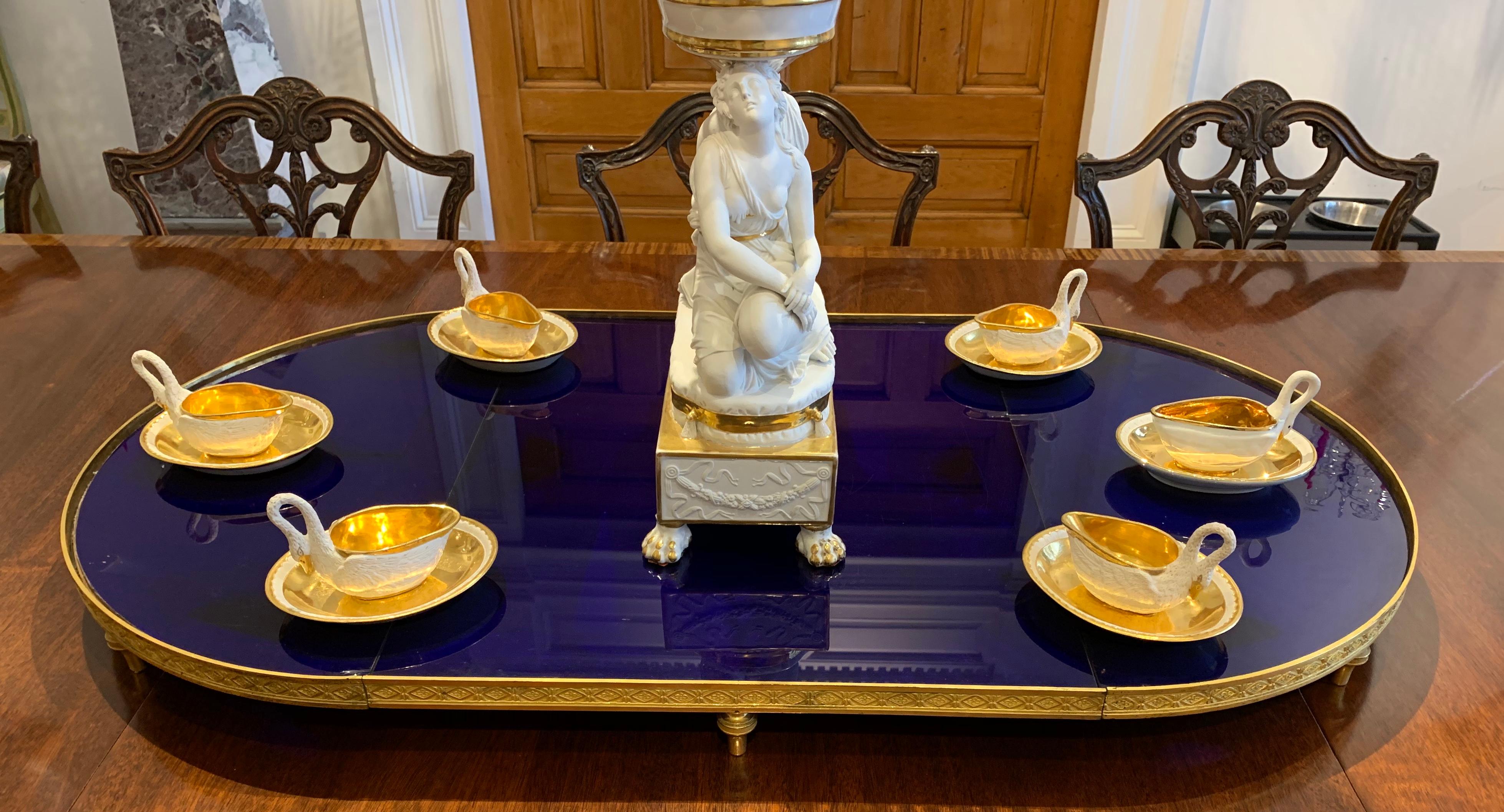 19th century Russian cobalt blue glass and ormolu neoclassical plateau.

Also know as a Surtout de table. In three parts so that it can also create circular form.