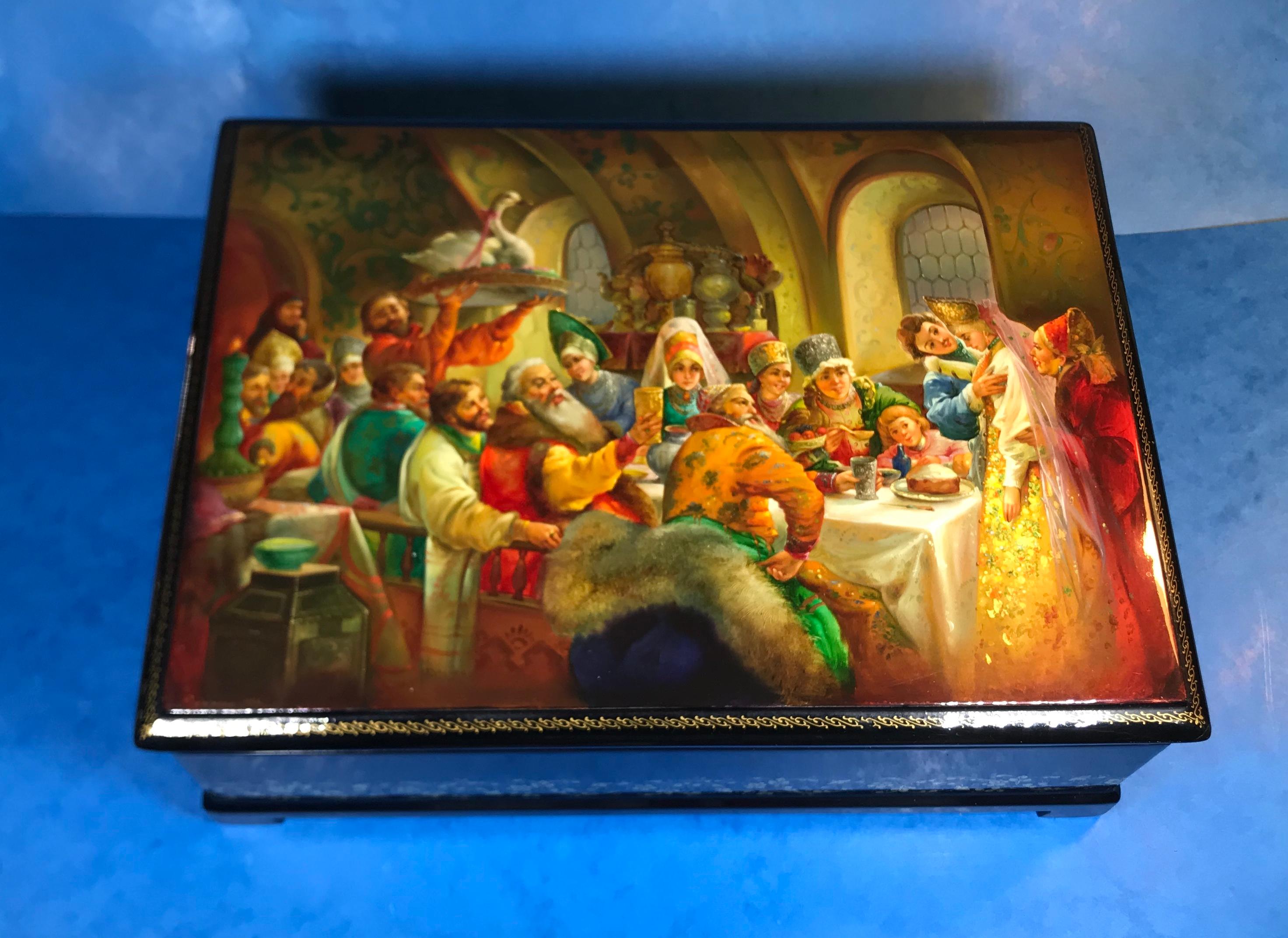 Russian painted papier mâché box. The box is Signed and dated 1966; it is of the famous Russian pre wedding party, beautifully clear, detailed with wonderful colors. It is in beautiful condition and has red lacquer interior. There is a hand painted