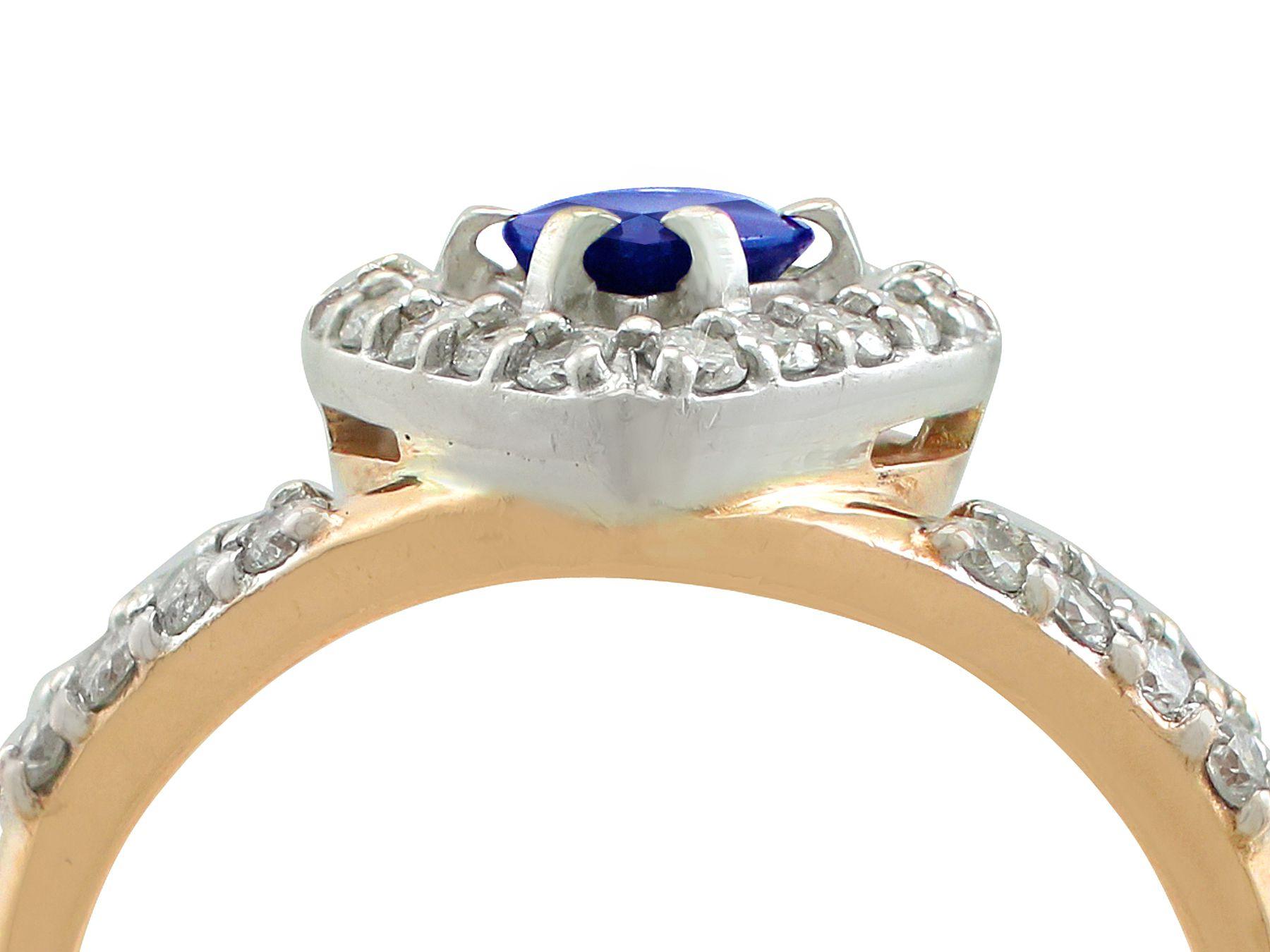 An impressive contemporary Russian 0.75 carat sapphire and 0.68 carat diamond, 14k yellow and white gold cocktail ring; part of our diverse antique jewelry collections.

This fine and impressive pear cut sapphire ring has been crafted in 14k yellow