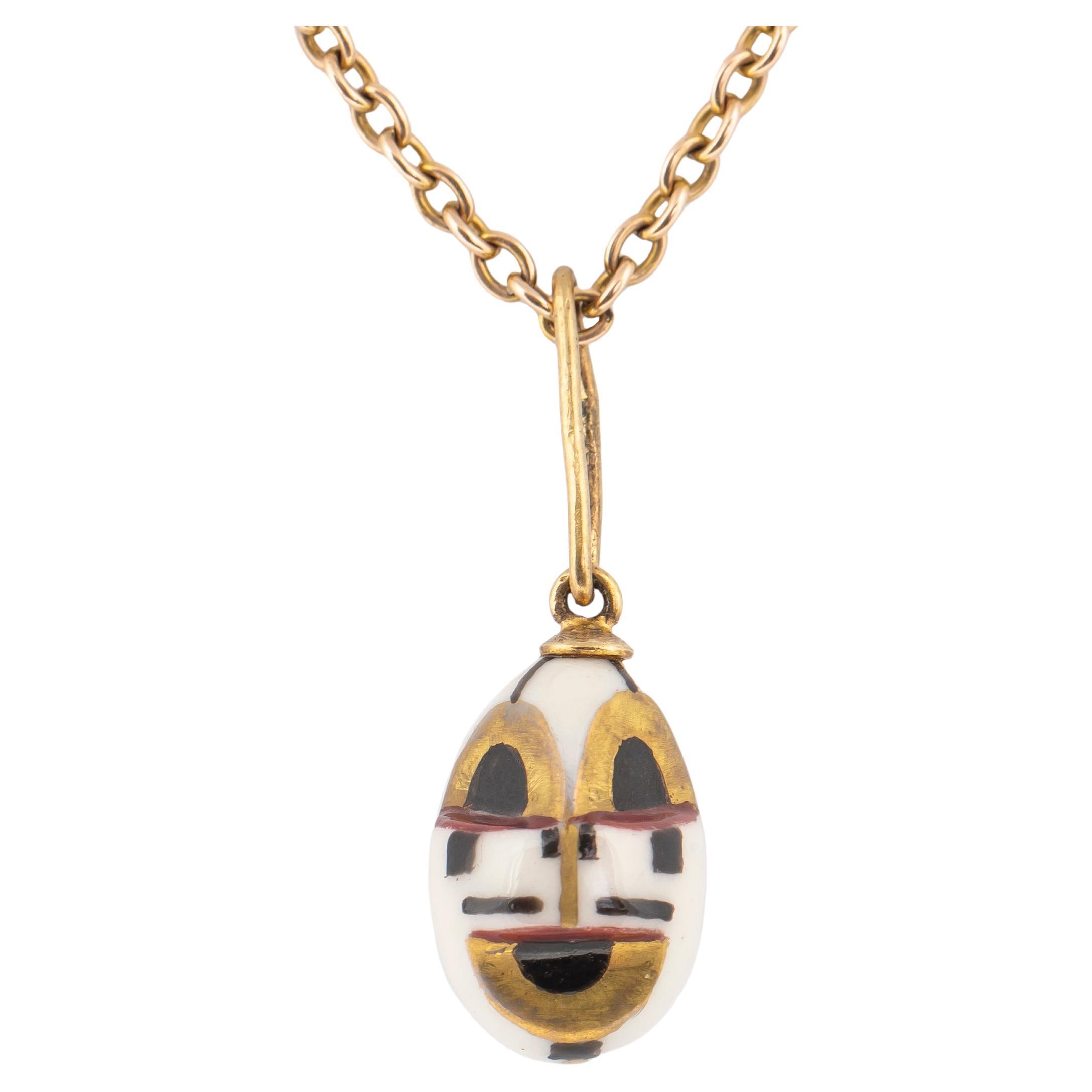 Russian Porcelain Mask Miniature Egg Pendant, Style of Malevich, 21st Century
