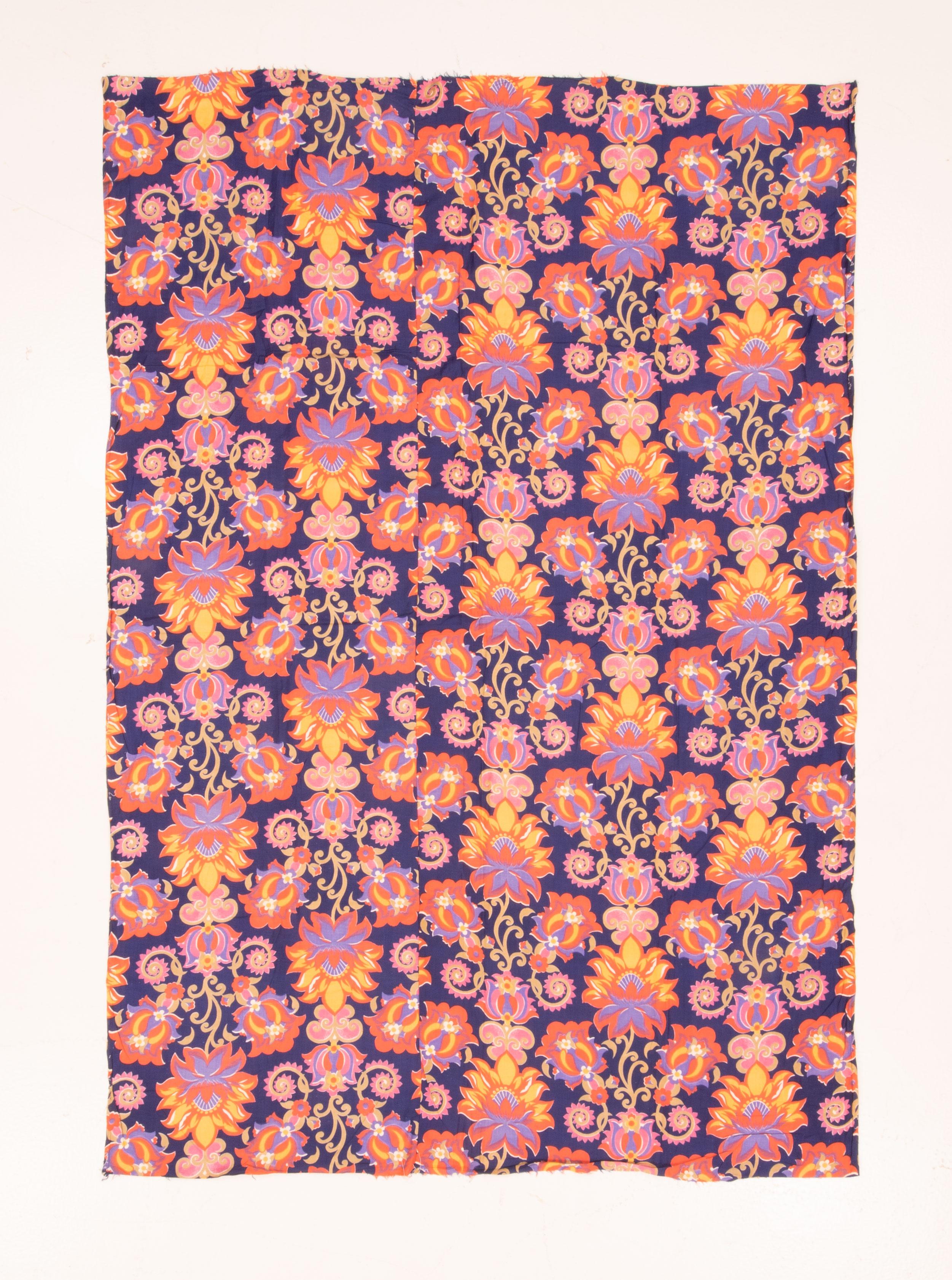 These type of Russian roller printed prints that are also called 'trade cloth' since they were made for Central Asian markets. They were used to make blankets and dresses, and also used for the lining of ikat chapans.