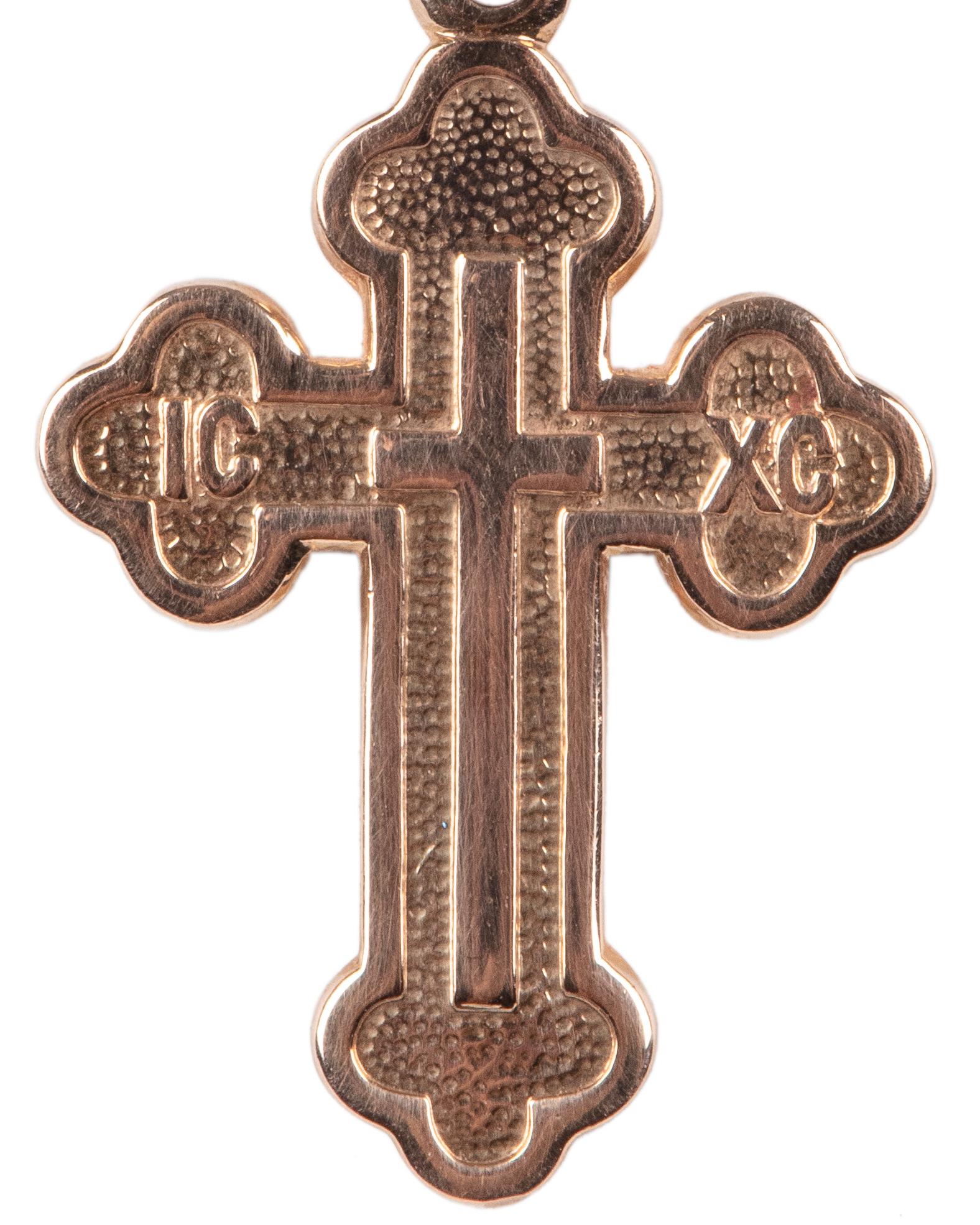 A beautiful Russian Orthodox cross pendant in rose gold, made in St. Petersburg, Russia.

St. Petersburg, 1990s, hallmarked.

1 1/4 in. (3.2 cm.) including suspension ring. Chain not included. 
