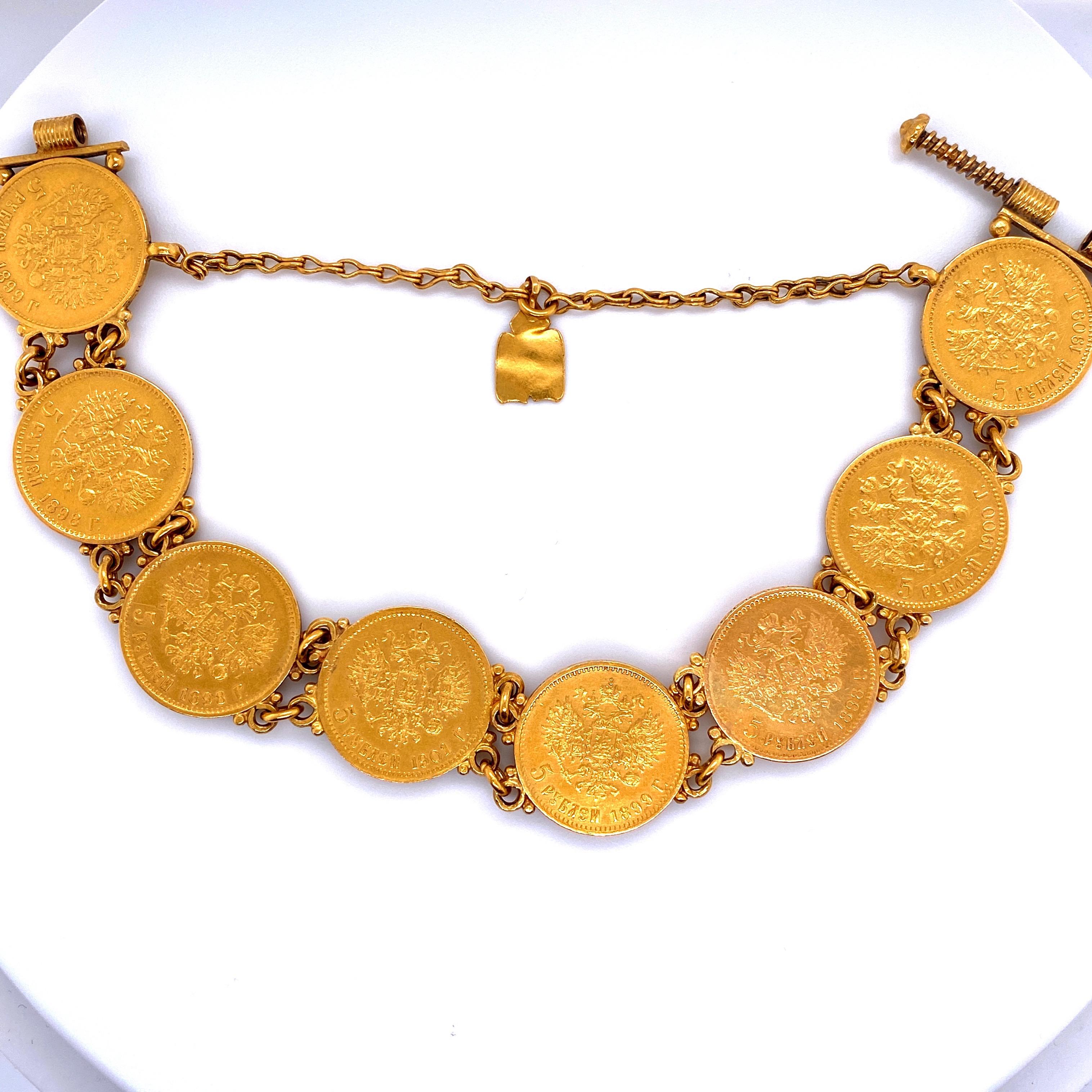 22K Yellow gold bracelet featuring 8 Russian Ruble coins dating back from 1898-1909, screwing bracket.

Additional coins available if needed to be longer.
Price does not reflect additional coins. 
