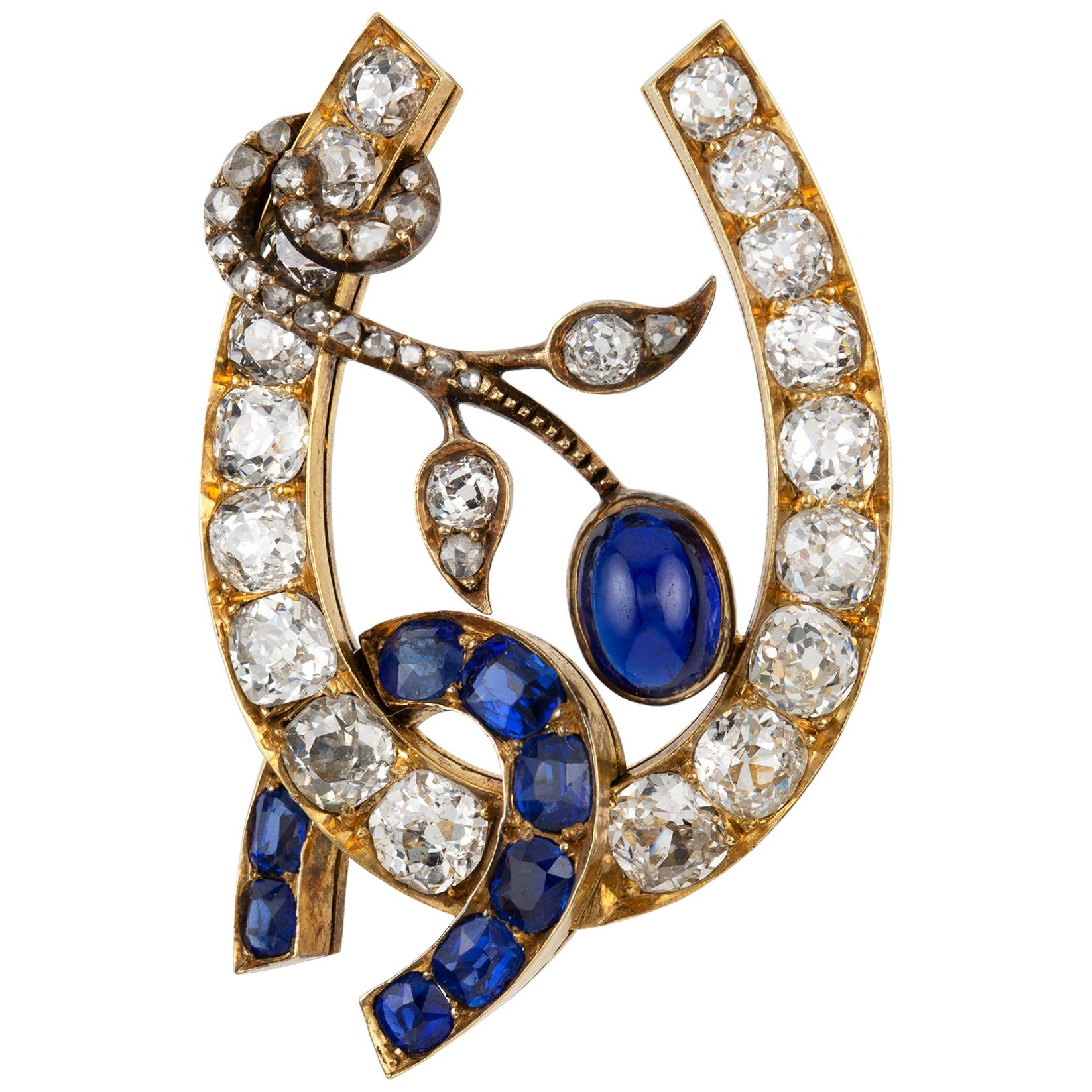 Russian Sapphire and Diamond Horse-Shoe Brooch For Sale