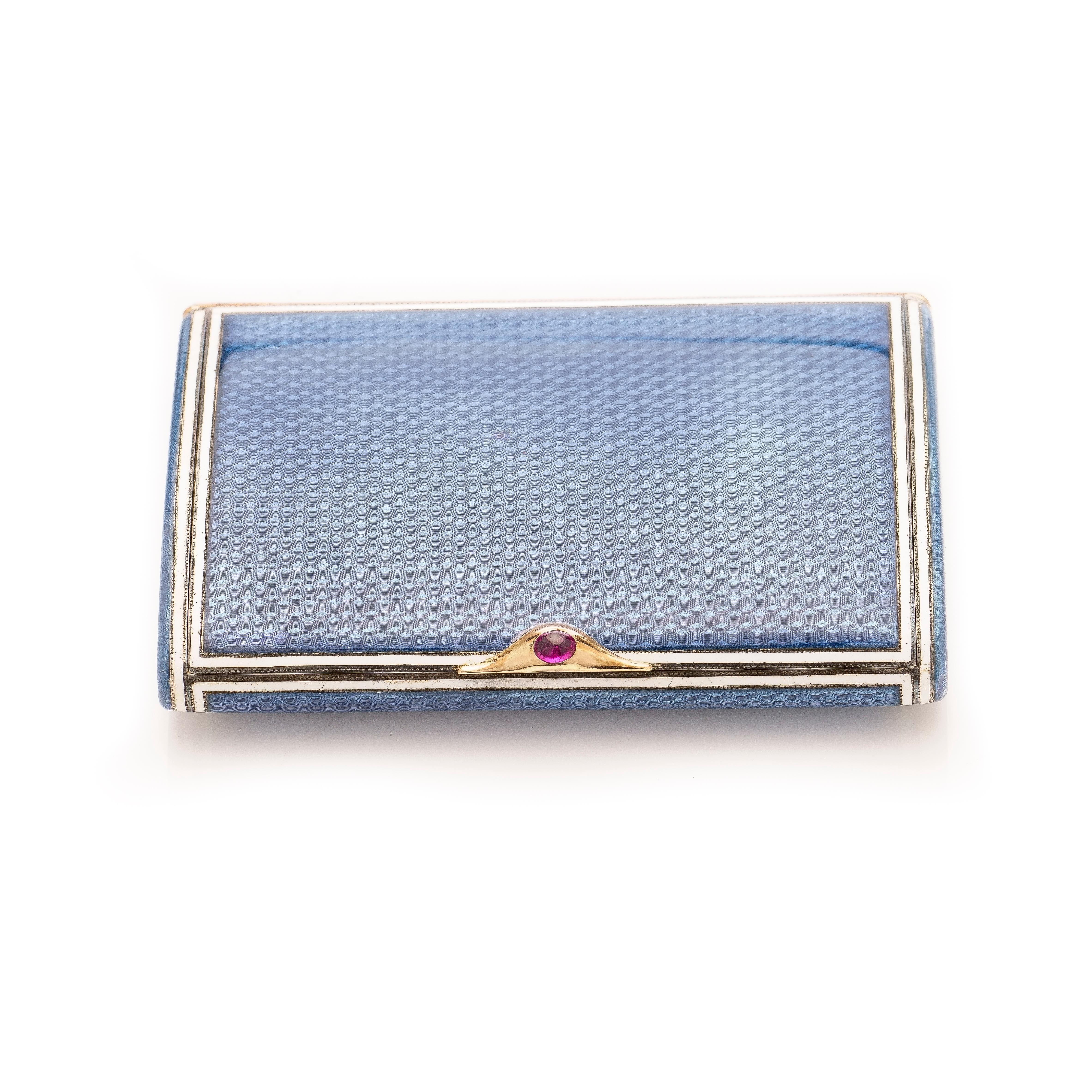Russian silver and guilloché enamel cigarette case, Ivan Britsyn, St. Petersburg, 1908-1917. 

Rectangular, of oval section, with sapphire purple translucent enamel over a wavy guilloché ground and with sapphire cabochon thumbpiece, marked