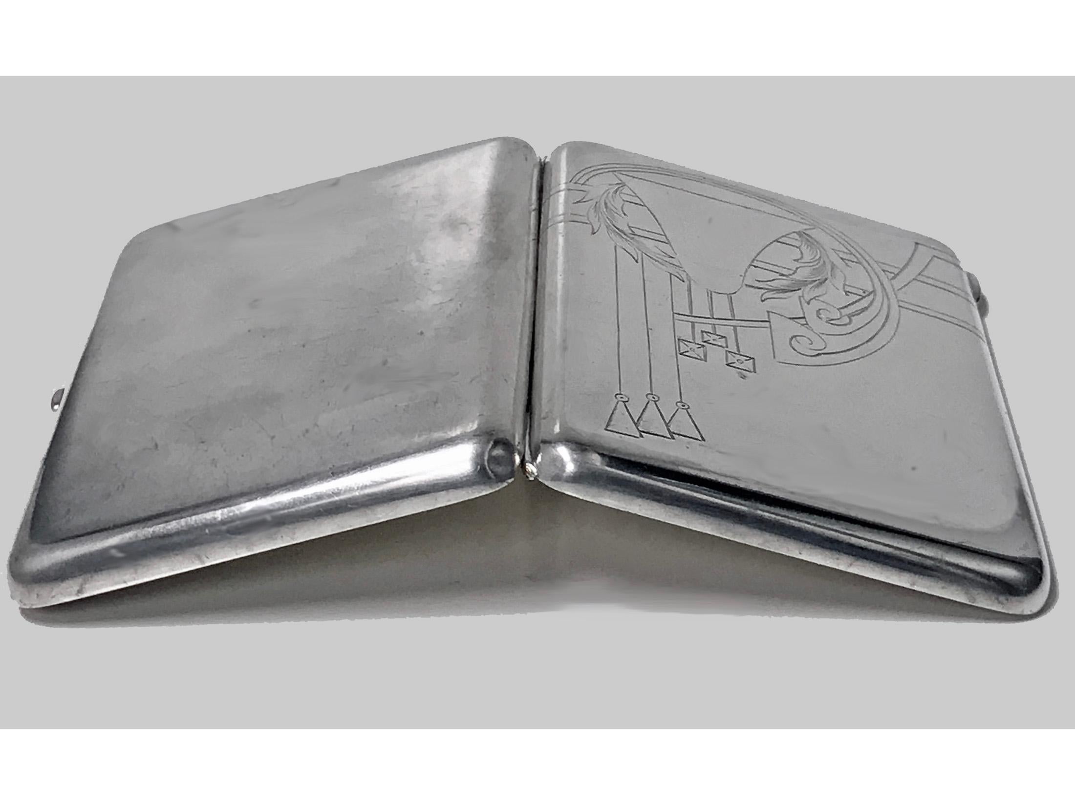 Russian silver cigarette case, 1908-1926, Feodosii Ivanovich Pekin, Moscow Kokoshnik mark. The box cover with stylised deco foliate design, interior of both cover and base maker's mark for Feodosii Ivanovich Pekin ... F and P in Cyrillic, Moscow 84