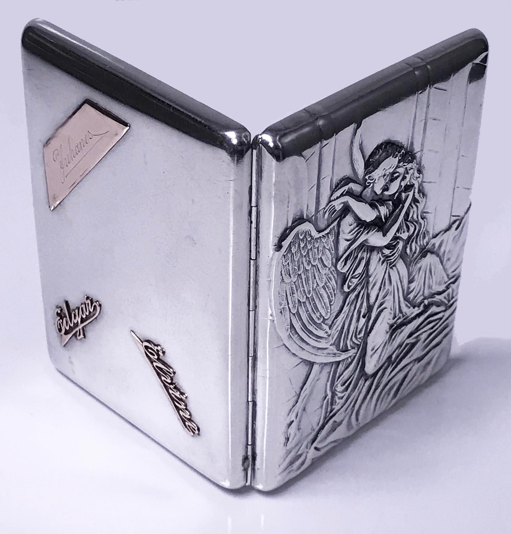 Russian silver cigarette case box, Konstantin Skvortsov, Moscow, 1887-1908 depicting Hermes Seduction of Aphrodite. The rectangular case with embossed raised relief depicting Hermes Seduction of Aphrodite, cabochon green stone thumb piece. The