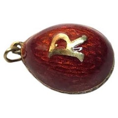 Imperial Silver Gilt Enamel Egg Pendant With A large Gilt "R"