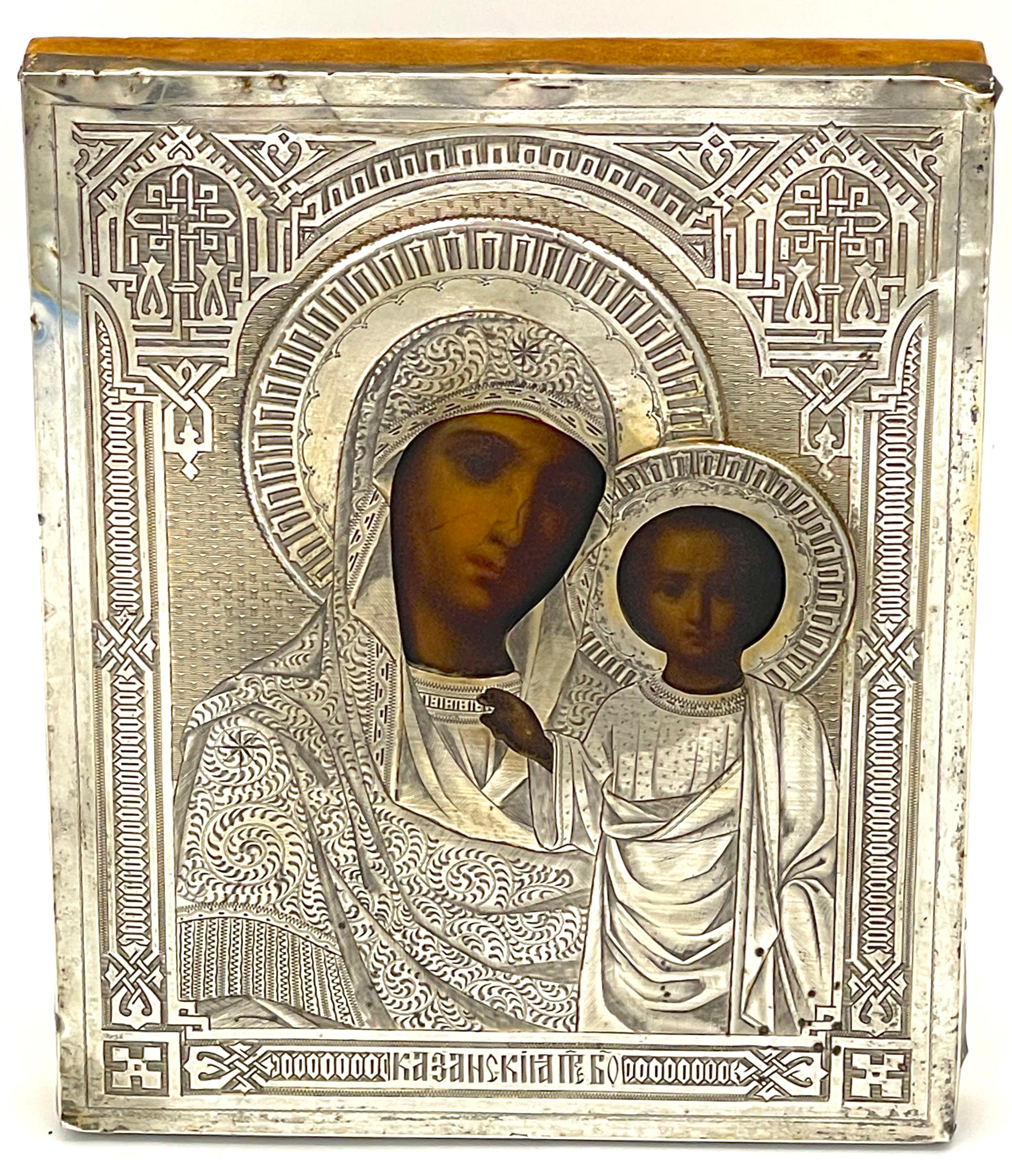 Russian Silver Icon, Our Lady of Kazan  1886
Bearing numerous Russian Silver hallmarks of d.c., in a rectangular 1 hallmark of 1886  and silver content hallmark of ’84 ‘

A fine example of the of Russian Orthodox tradition with this extraordinary
