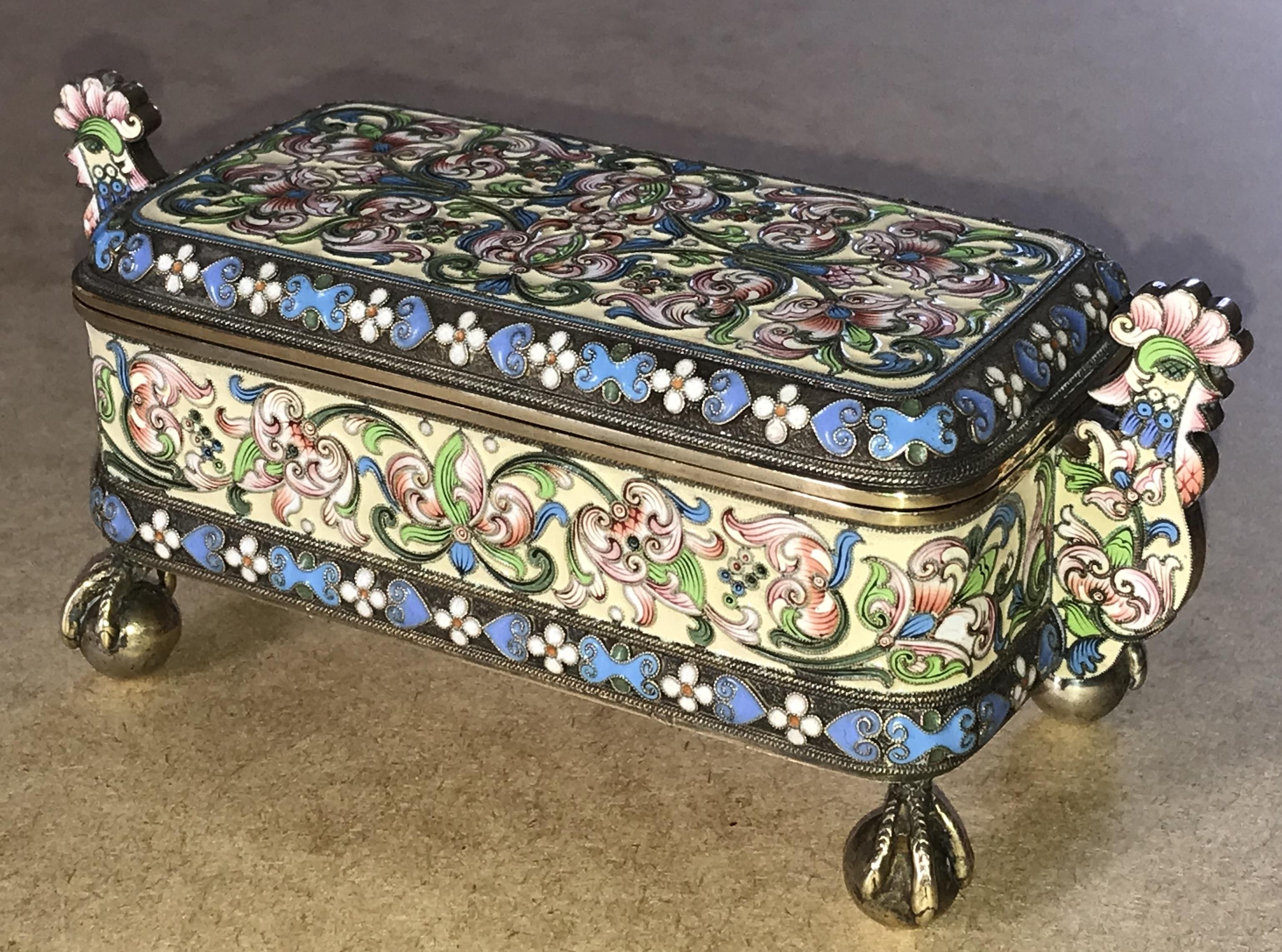We are delighted to offer for sale this stunning and very rare full sized Imperial Russian 1891 Cloisonné enamel casket box made from solid silver with gold gilding by the highly coveted Pavel Ovchinnikov whilst he worked with Ivan Khlebnikov