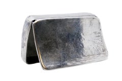 Russian silver snuff box with a curved shape and traces of engraving