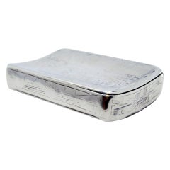 Russian silver snuff box with a curved shape and traces of engraving