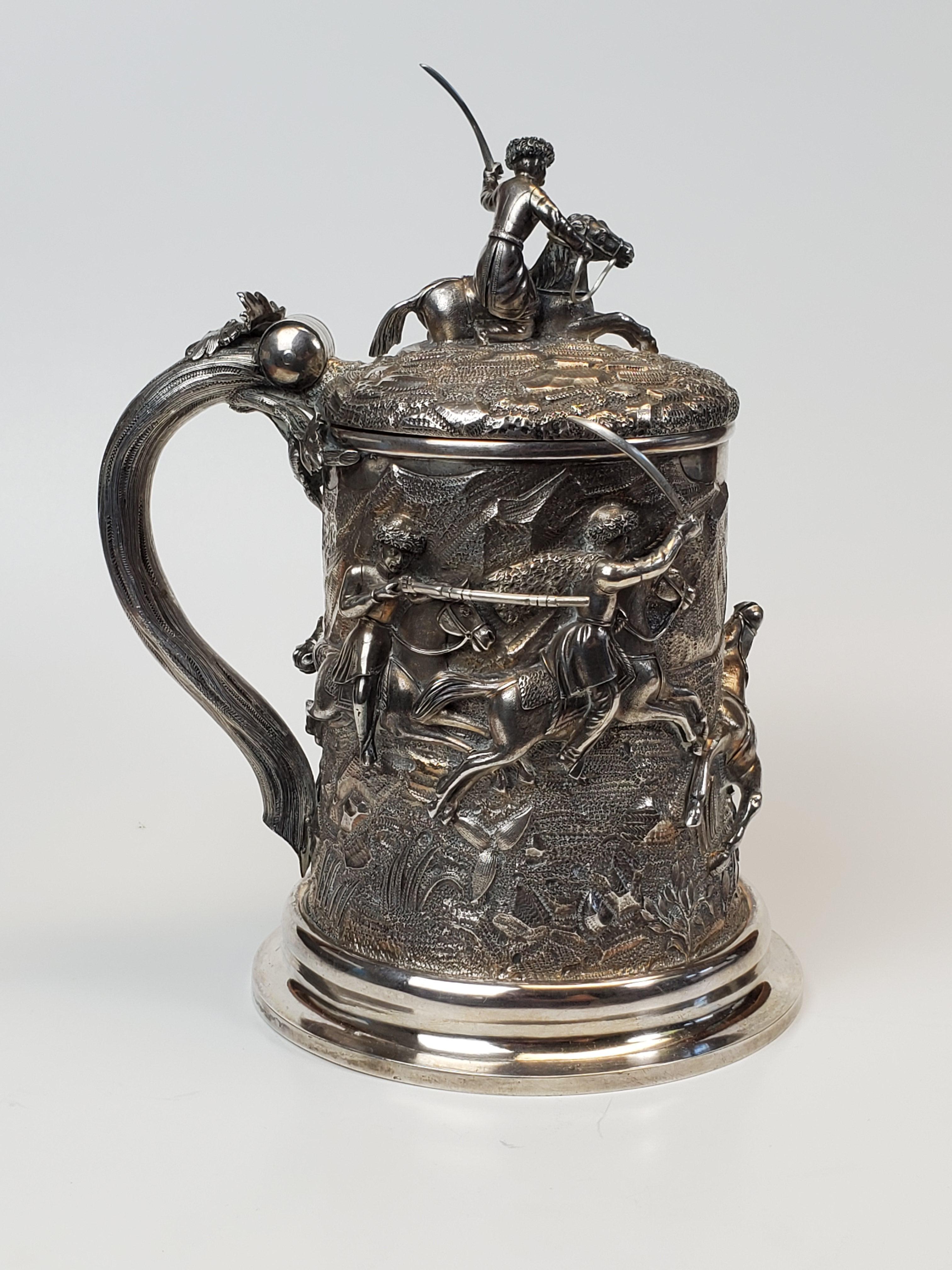 Russian Silver Stein 1854. 0.875 Silver

Every now and then you come across something that is truly extraordinary.
This is one of those of times.

This silver stein was crafted in in 1854 to celebrate the Russian and more specifically Cossack