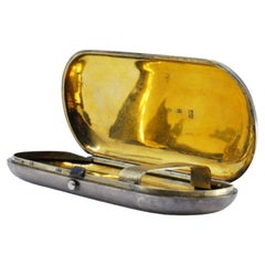 Russian-style elliptical silver cigarette case with gold interior Russian-style elliptical silver cigarette case with gold interior