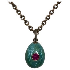 Russian Teal Blue Enamel Ruby Egg Pendant, circa 1900