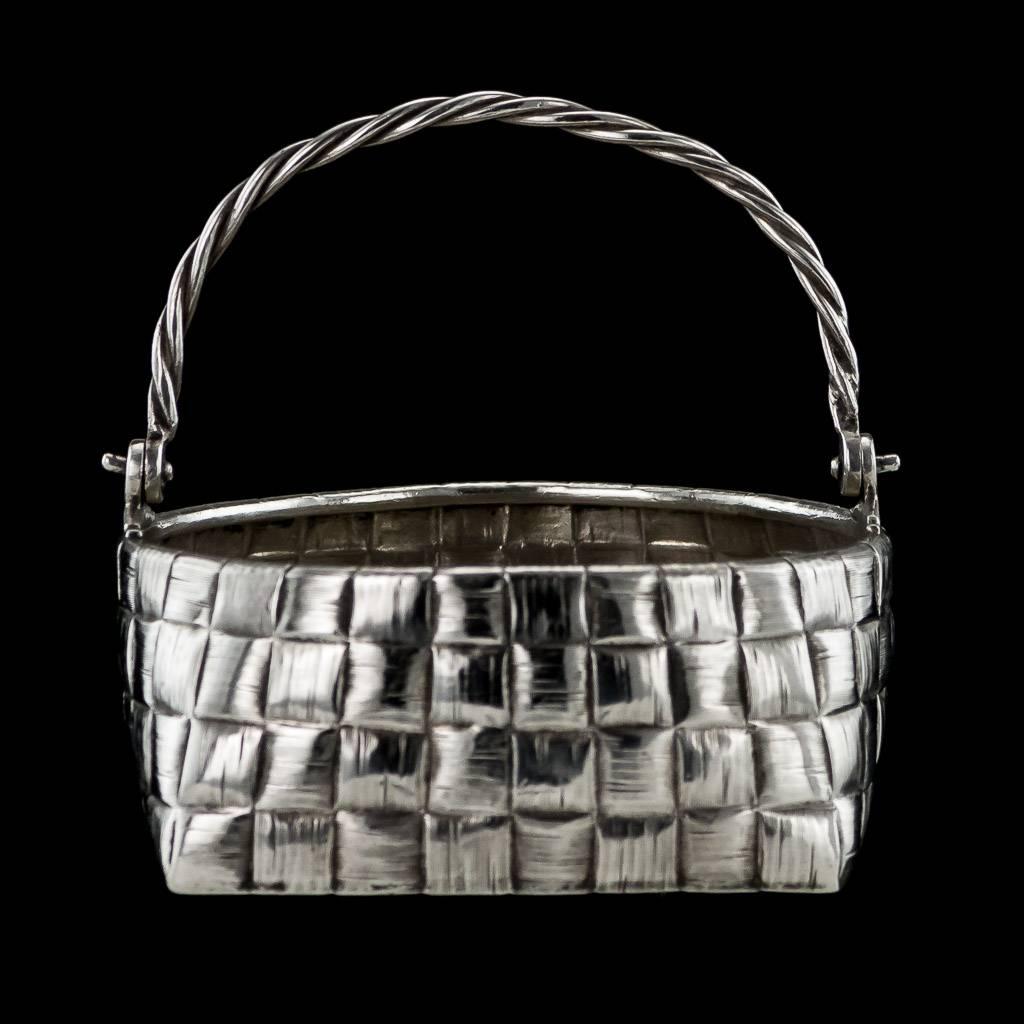 Antique 20th century Imperial Russian trompe l'oeil solid silver sugar basket, with basket-weave sides and ropework swinging handle. All parts Hallmarked Russian Silver 84 (875 standard), St-Petersburg, assey master Yakov Lyapunov (active
