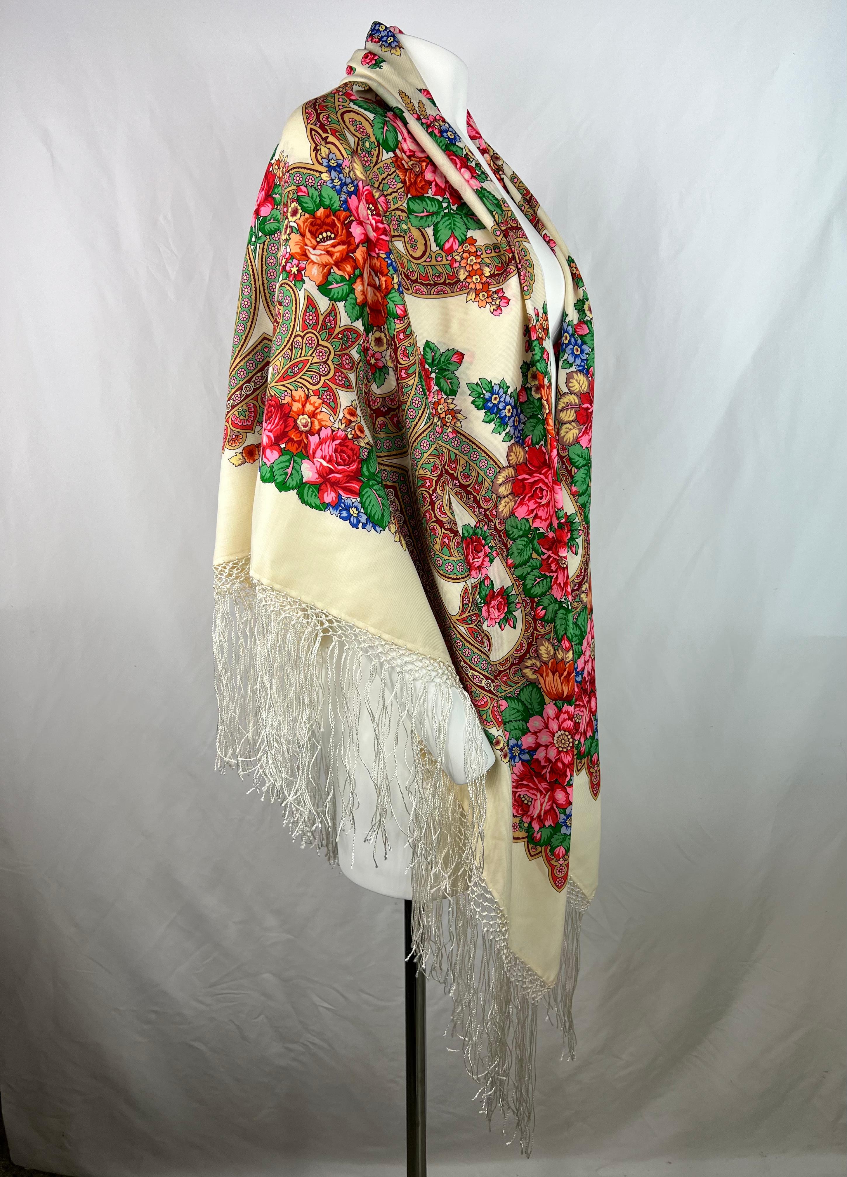 Product details:

The scarf features multicolored floral print with silk fringe detail, measures 10 inches long.