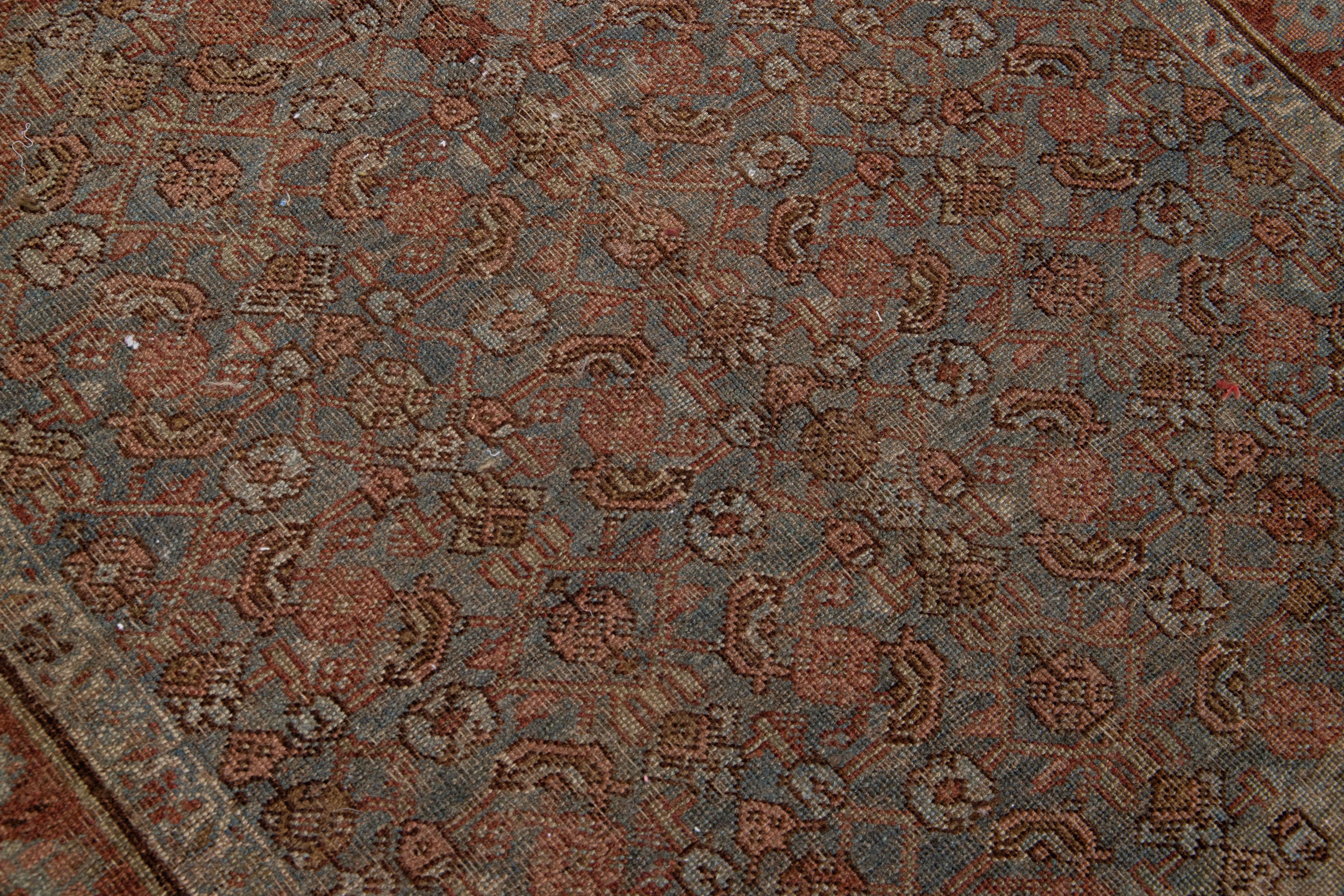 Rust 19th Century Handmade Persian Malayer Wool Rug With Allover Motif In Good Condition For Sale In Norwalk, CT