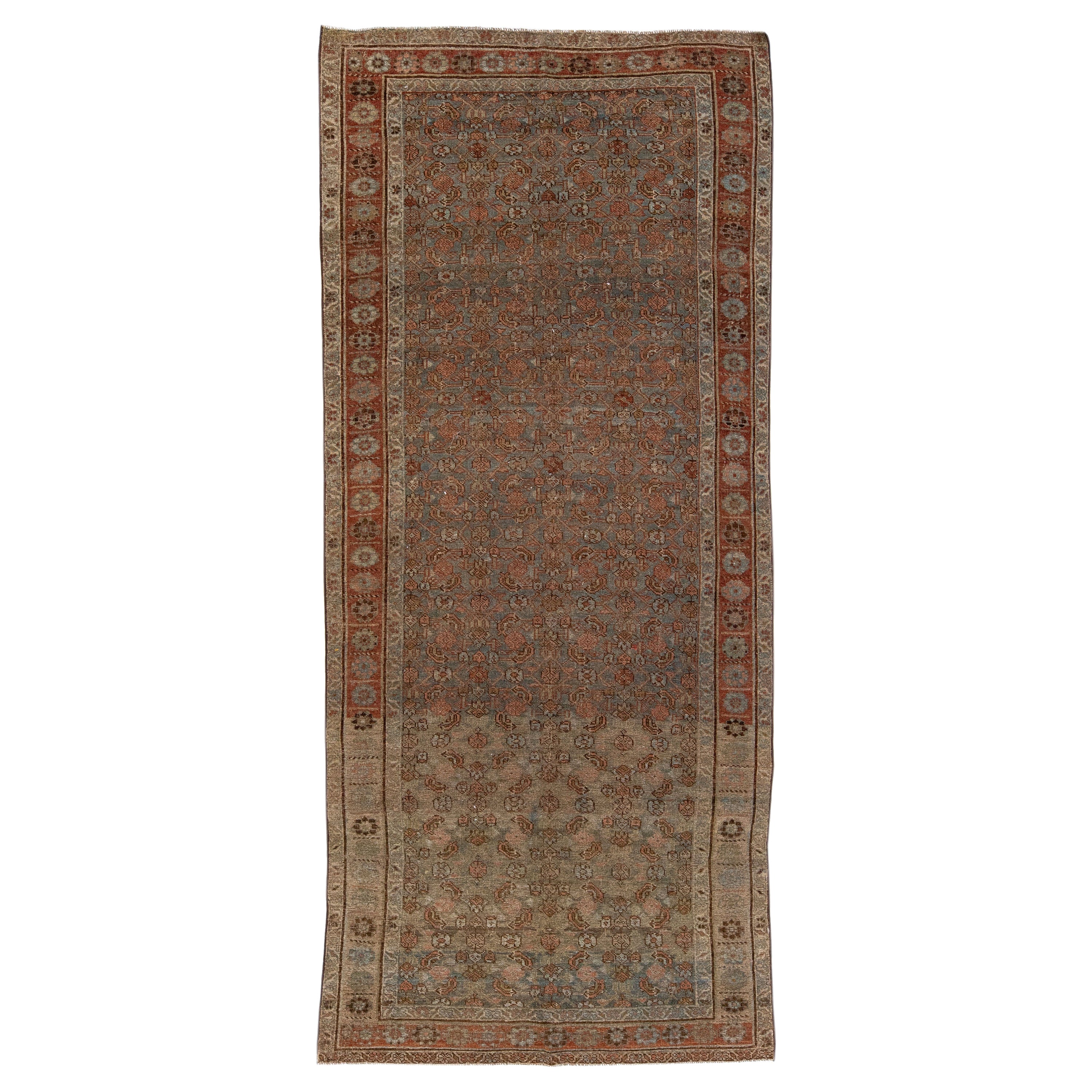 Tapis persan Malayer en laine rouille du 19ème siècle fait à la main avec motif sur toute sa surface